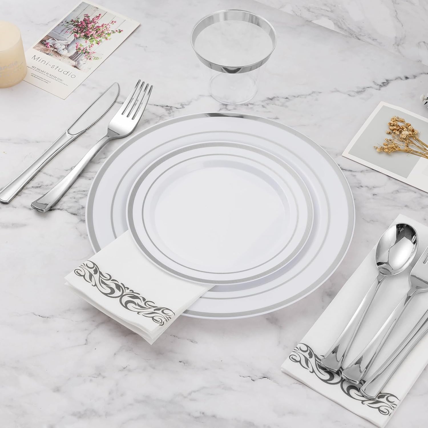 BESTVIP 700-piece silver plastic dinnerware set for 100 guests, includes plates, bowls, and utensils for large gatherings