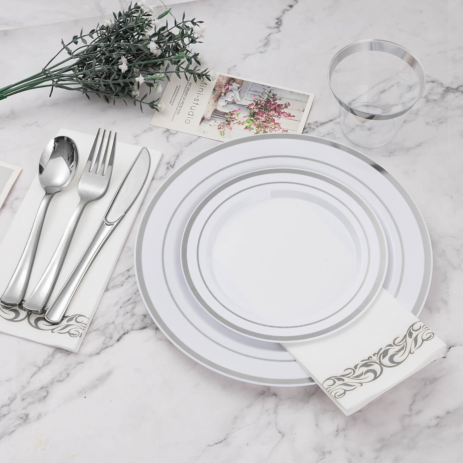 BESTVIP 700-piece silver plastic dinnerware set for 100 guests, includes plates, bowls, and utensils for large events