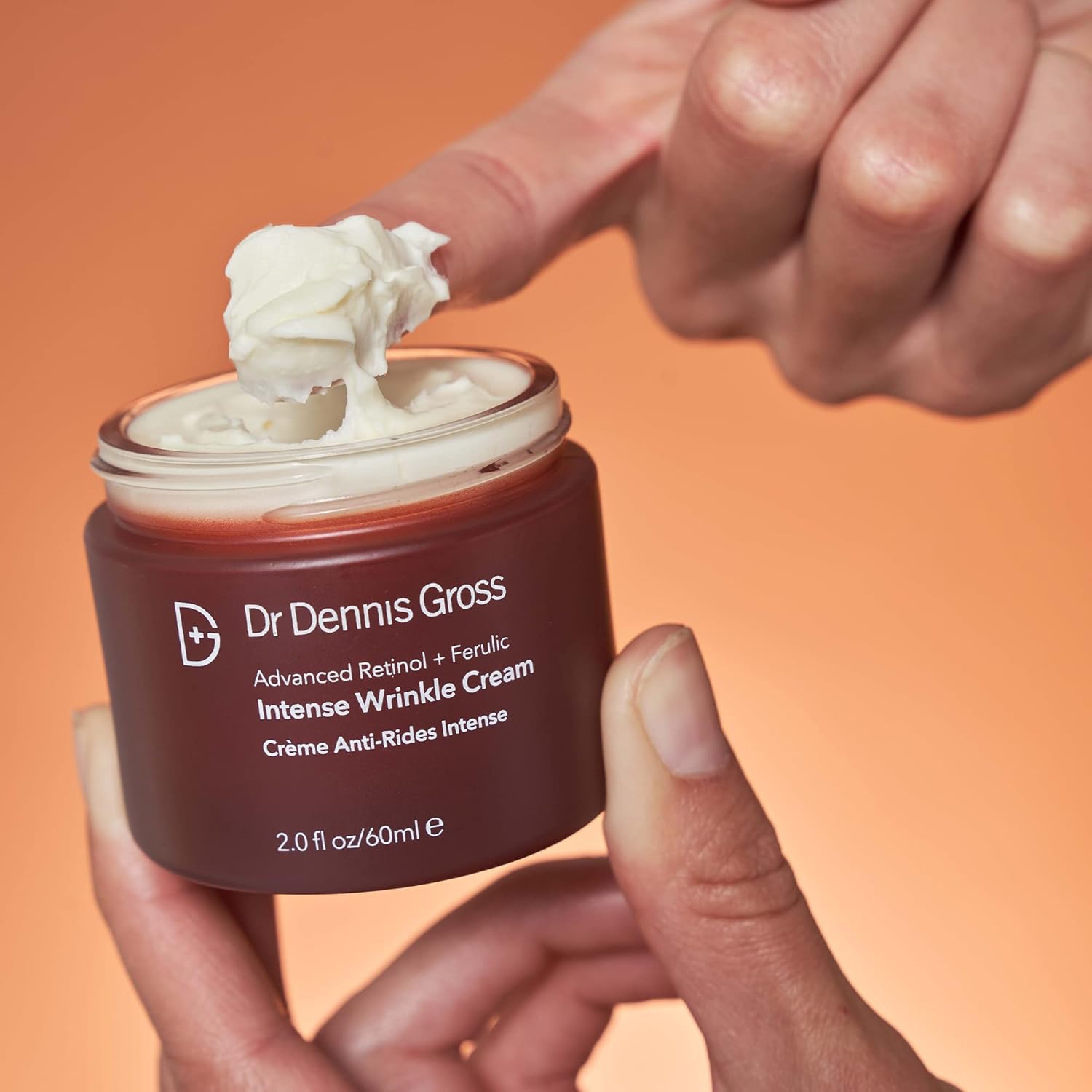 Dr Dennis Gross Advanced Retinol + Ferulic wrinkle cream jar showing the hydrating skincare product in a sleek container.