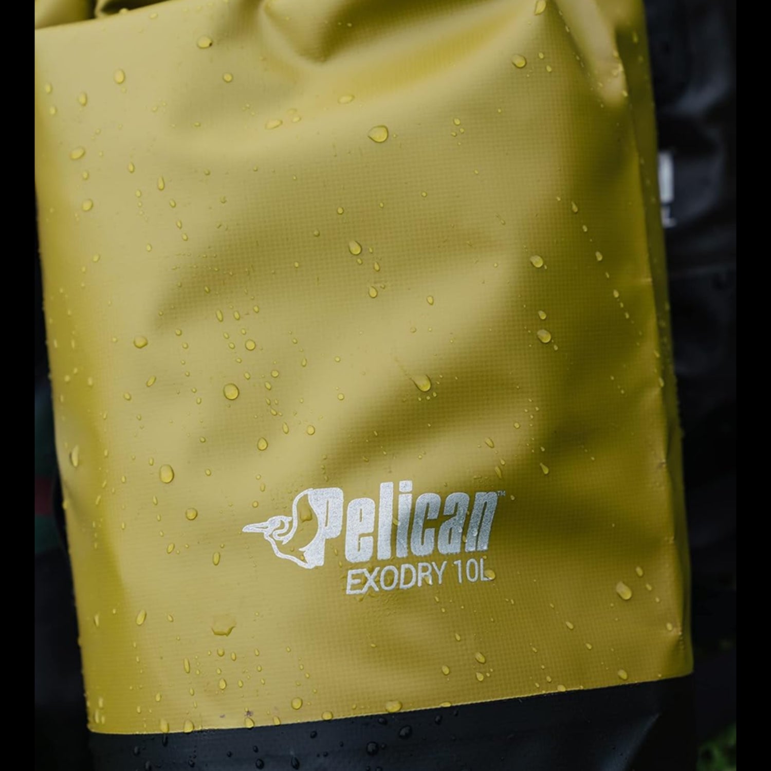 Pelican 30L waterproof dry bag with reflective material, Exodry waterproof design, shown with rolled top closure and rugged exterior.