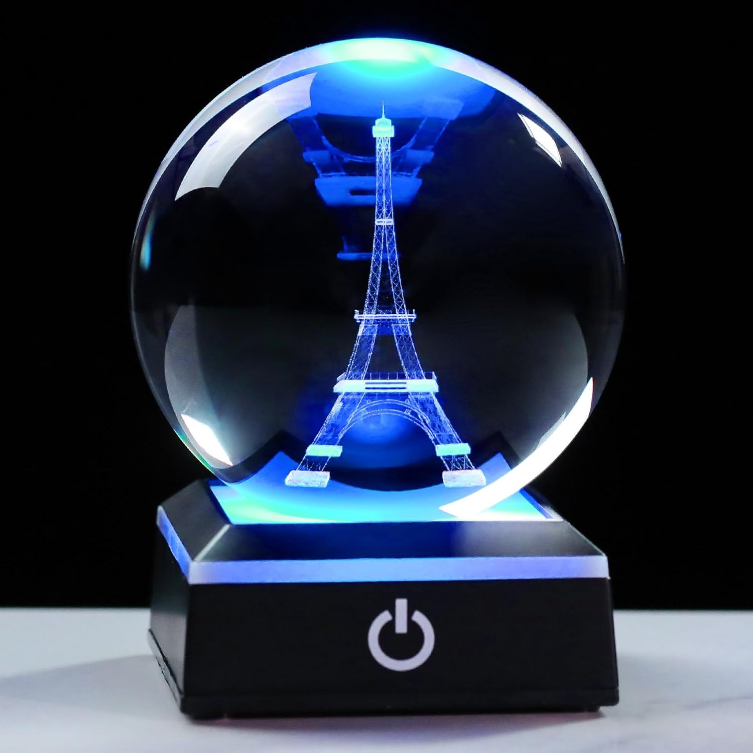 Enjinkail 3D crystal snow globe featuring Paris Eiffel Tower design, with snow inside and decorative base, ideal for gift or decor.