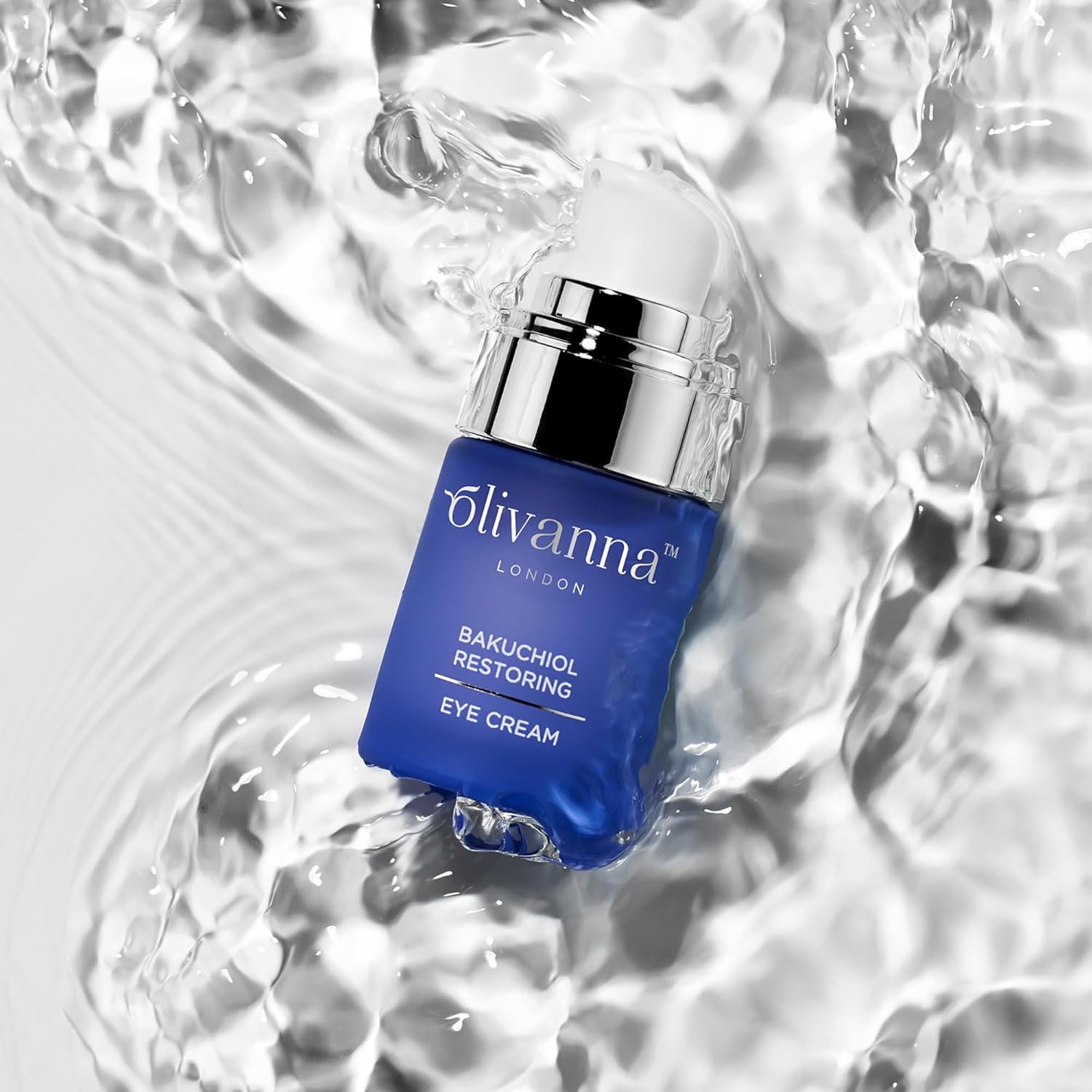 Olivanna Bakuchiol Restoring Eye Cream with elderflower extract, showing the cream tube and eye area for reducing visibility of fine lines.