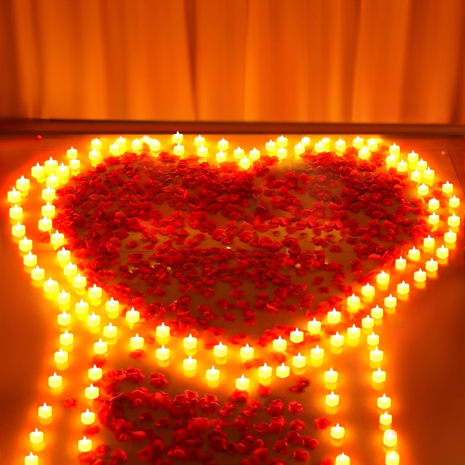 Set of 6000 artificial rose petals and 72 flameless candles from gobutend, perfect for romantic decorations and events.