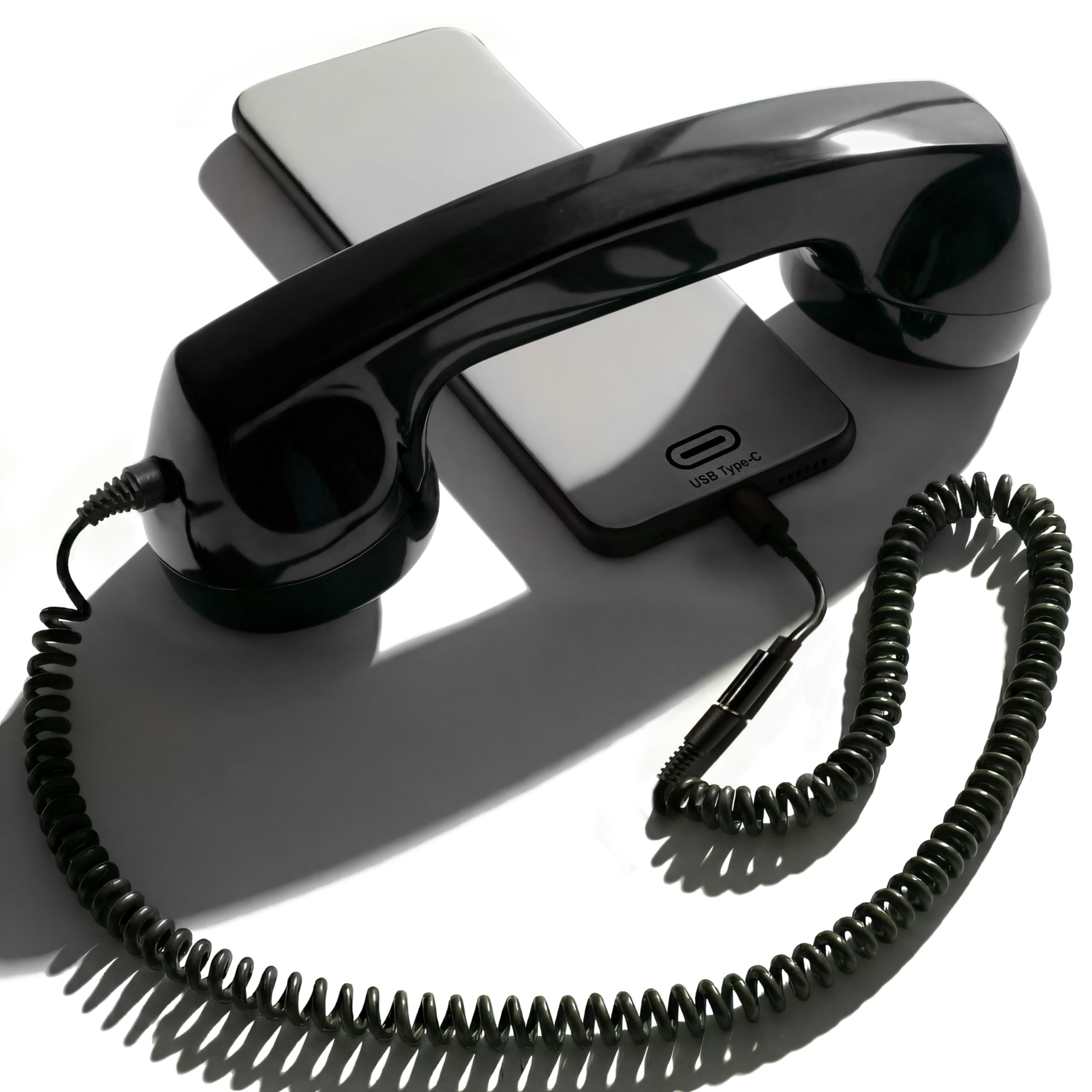 Opis Technology 60s Micro Retro Phone Handset in black, designed for smartphones, featuring vintage style and ergonomic design.