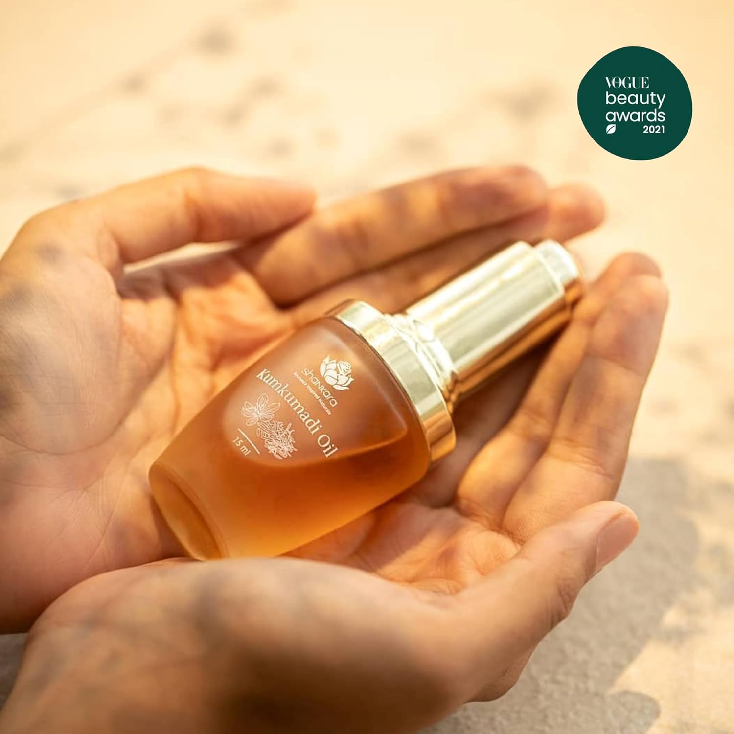 Shankara Kumkumadi Oil for face with pure saffron and 32 Ayurvedic flowers, in a glass bottle with dropper applicator.
