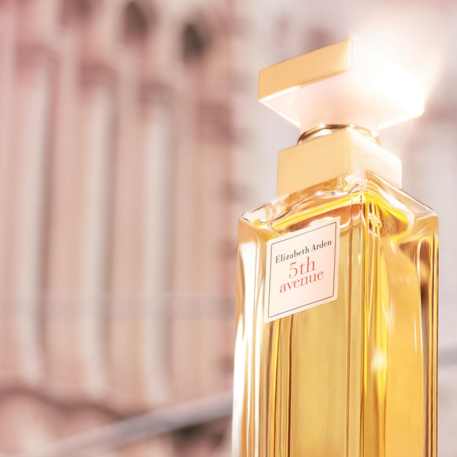 Elizabeth Arden 5th Avenue floral perfume for women, eau de parfum bottle with elegant floral design and gold accents.