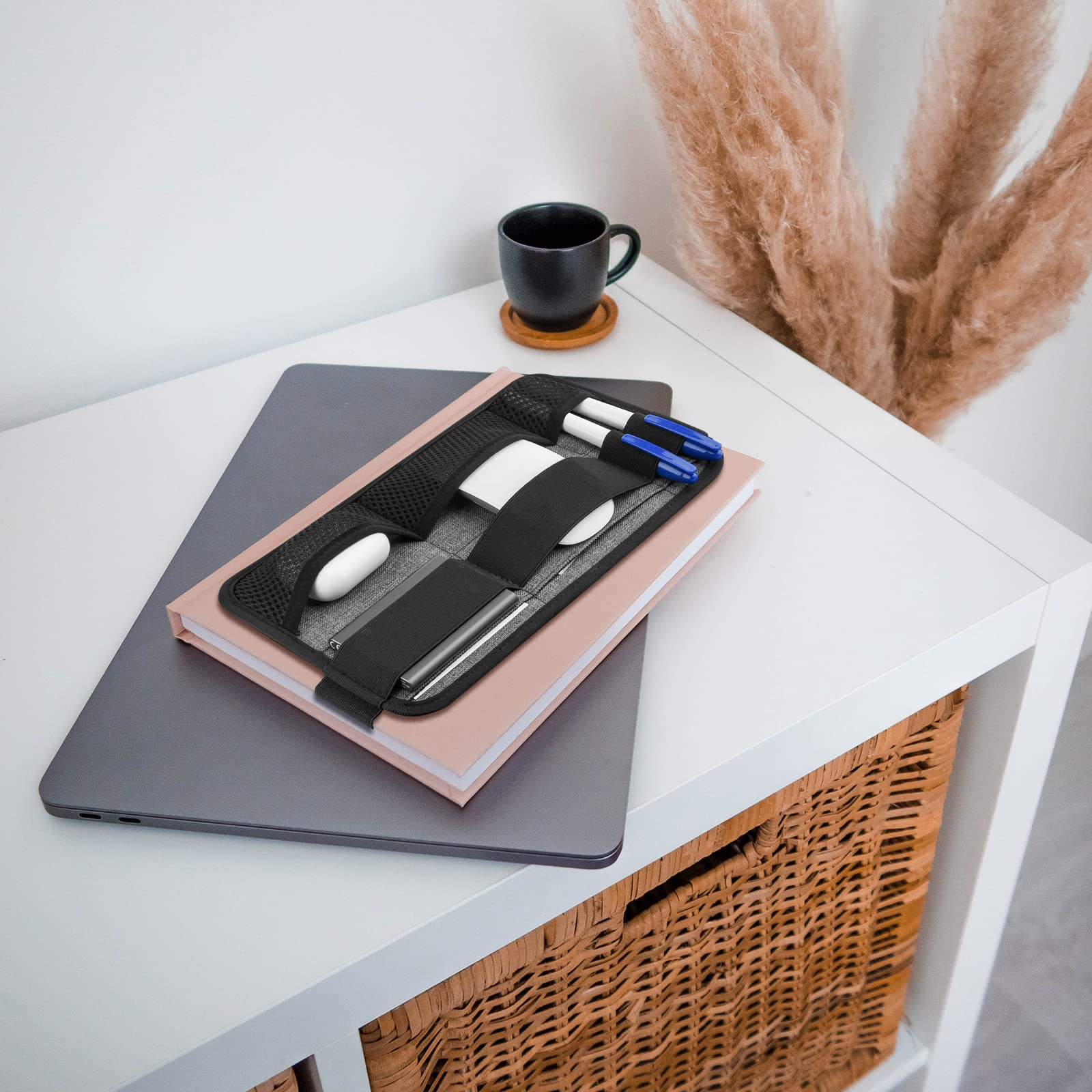 Gray Homakover portable tech organizer caddy attached to laptop, holding cables, mouse, power bank, USB adapters, and charger.