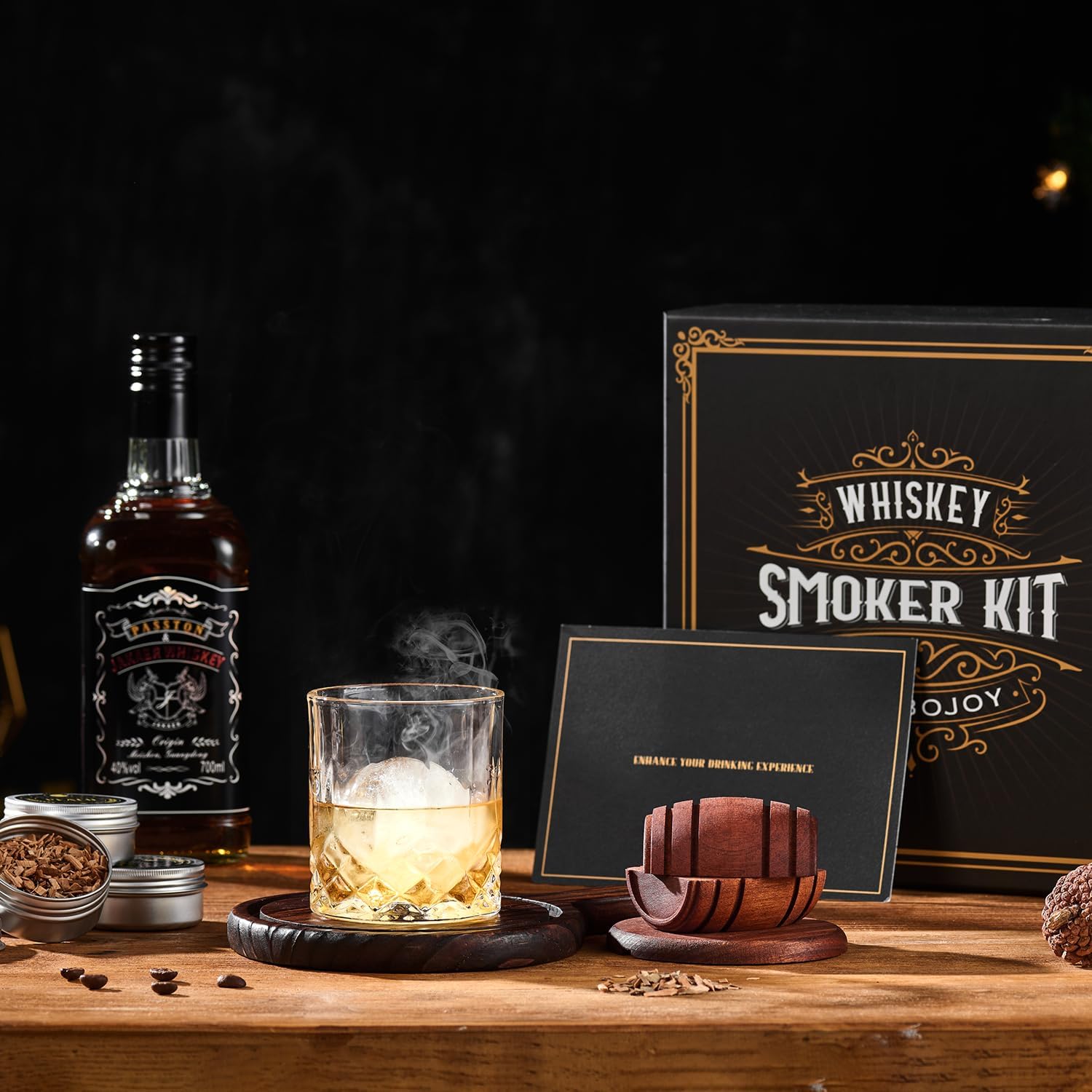ComboJoy whiskey smoker kit with torch, 6 wood chip flavors, 2 glasses, and 2 ice ball molds for flavorful whiskey smoking.