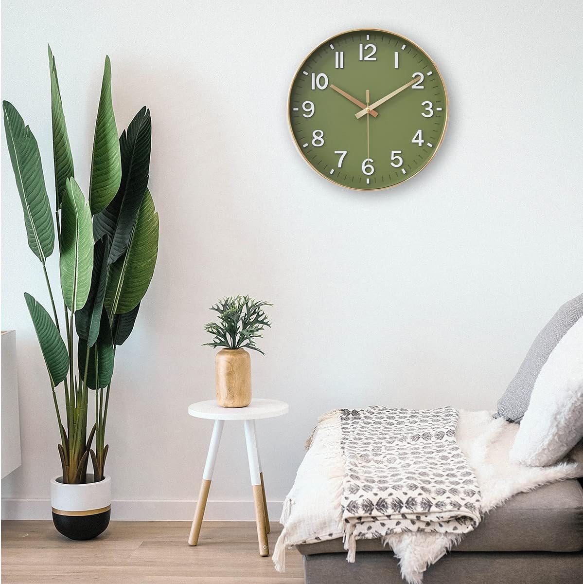 HZDHCLH 12-inch battery-operated wall clock with silent movement, modern design, and easy-to-read face.