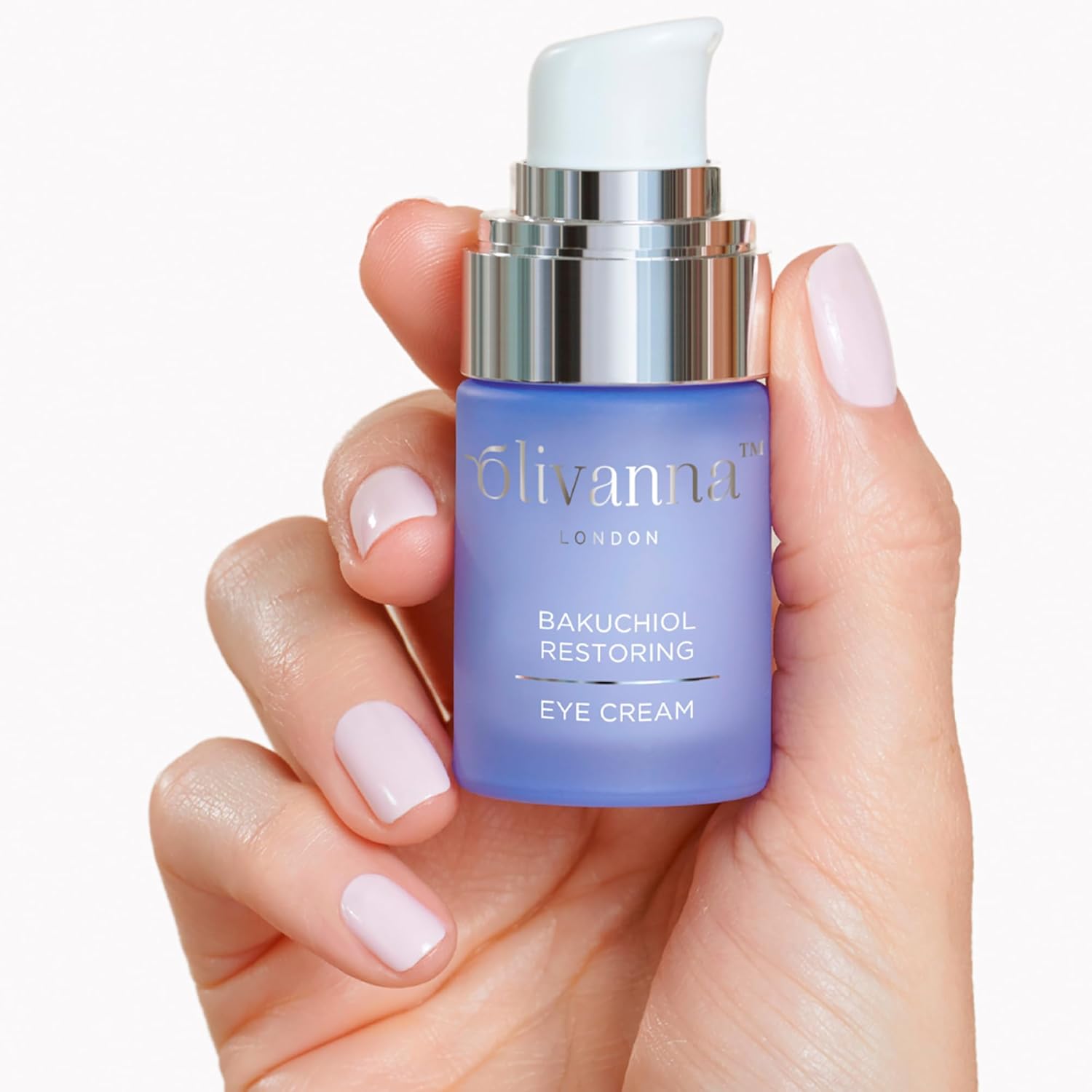 Olivanna Bakuchiol Restoring Eye Cream with elderflower extract, showing the cream in a jar with fresh elderflowers.