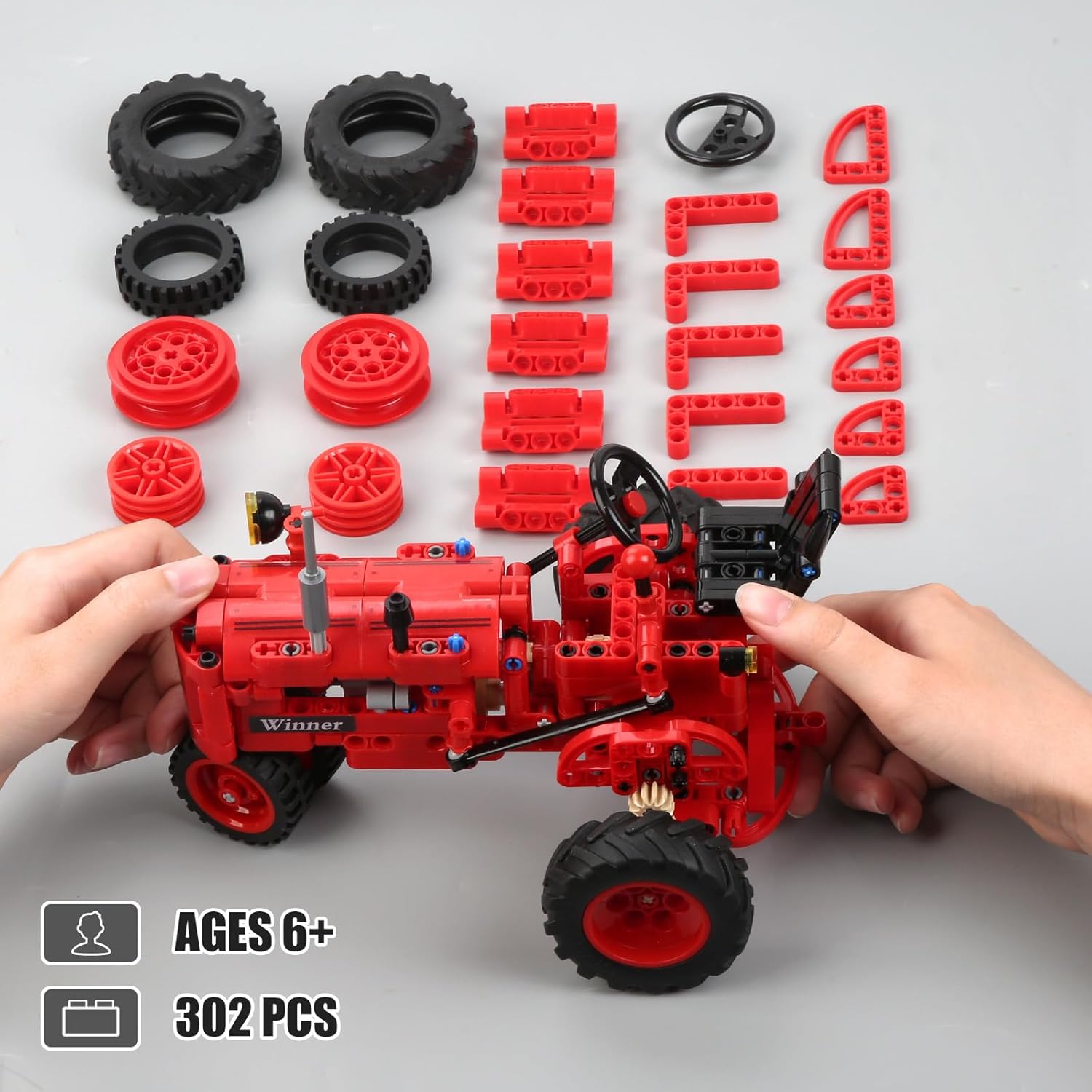 Red farm tractor building blocks set by WanJJXW, featuring classic 1/12 scale farm tractor toy for kids to assemble and play.