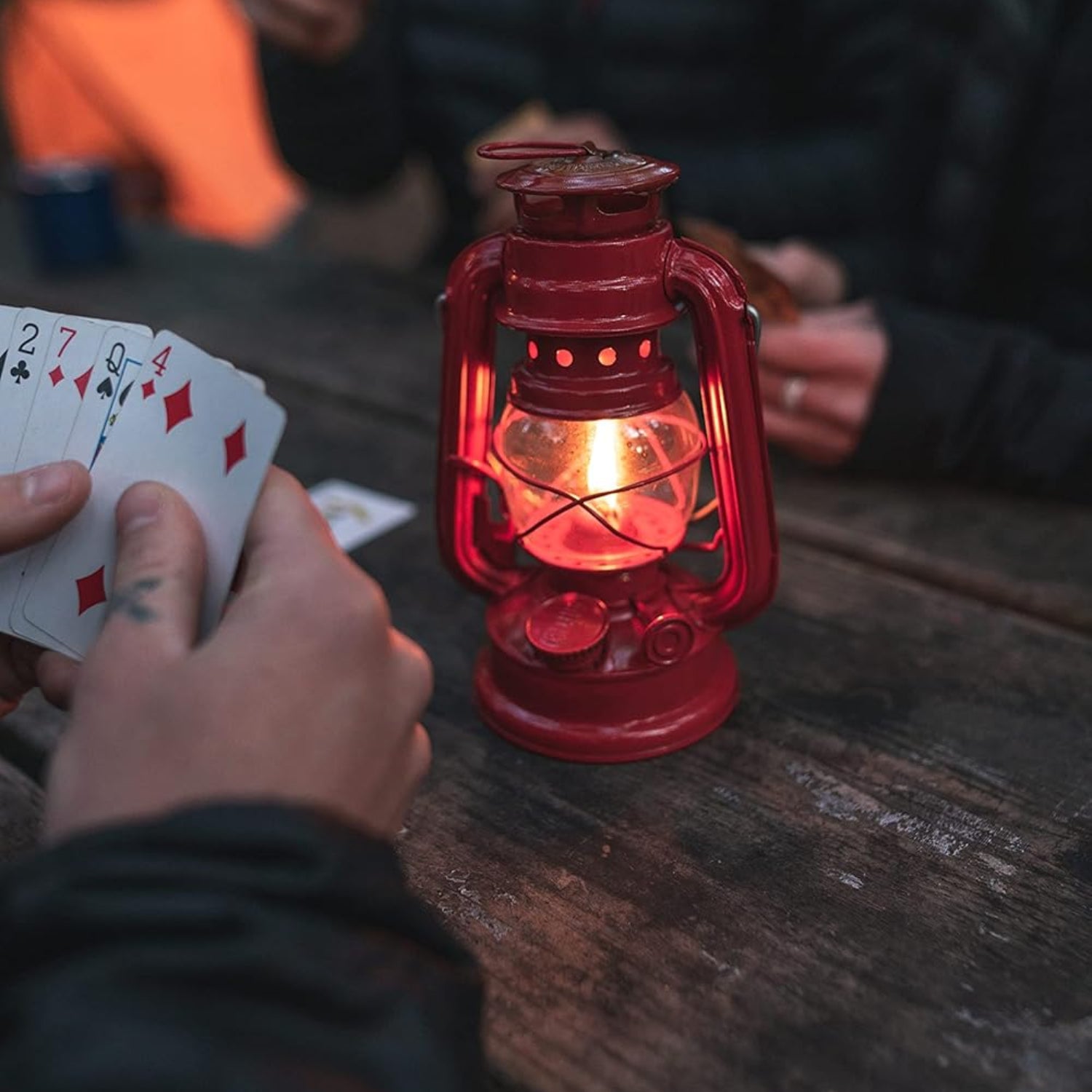 Stansport Hurricane Lantern with metal frame and glass chimney, classic kerosene oil lamp for outdoor or emergency lighting.
