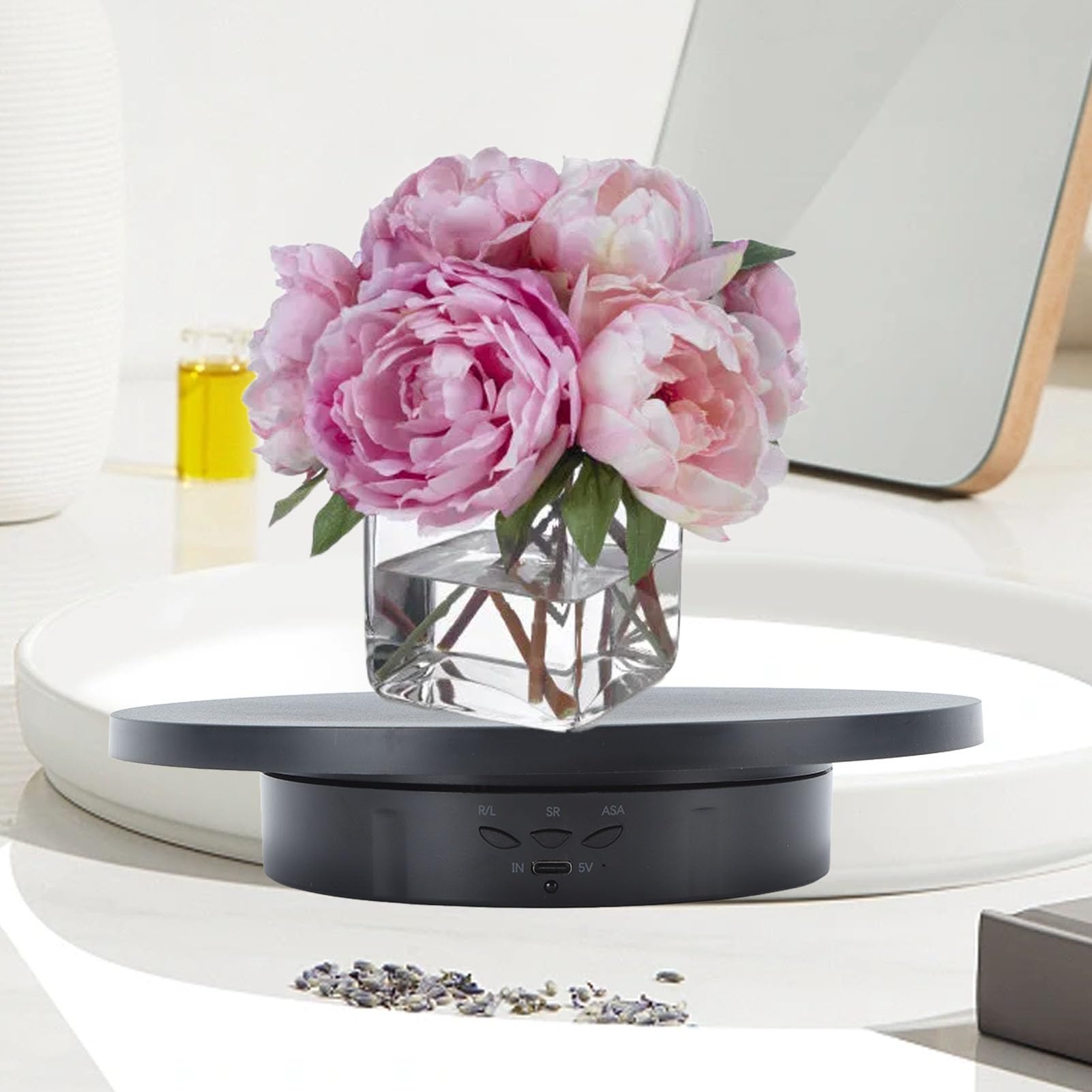 Black electric rotating jewelry display tray with remote control, 360-degree rotation, 3 speed settings, ideal for live streaming and photography.
