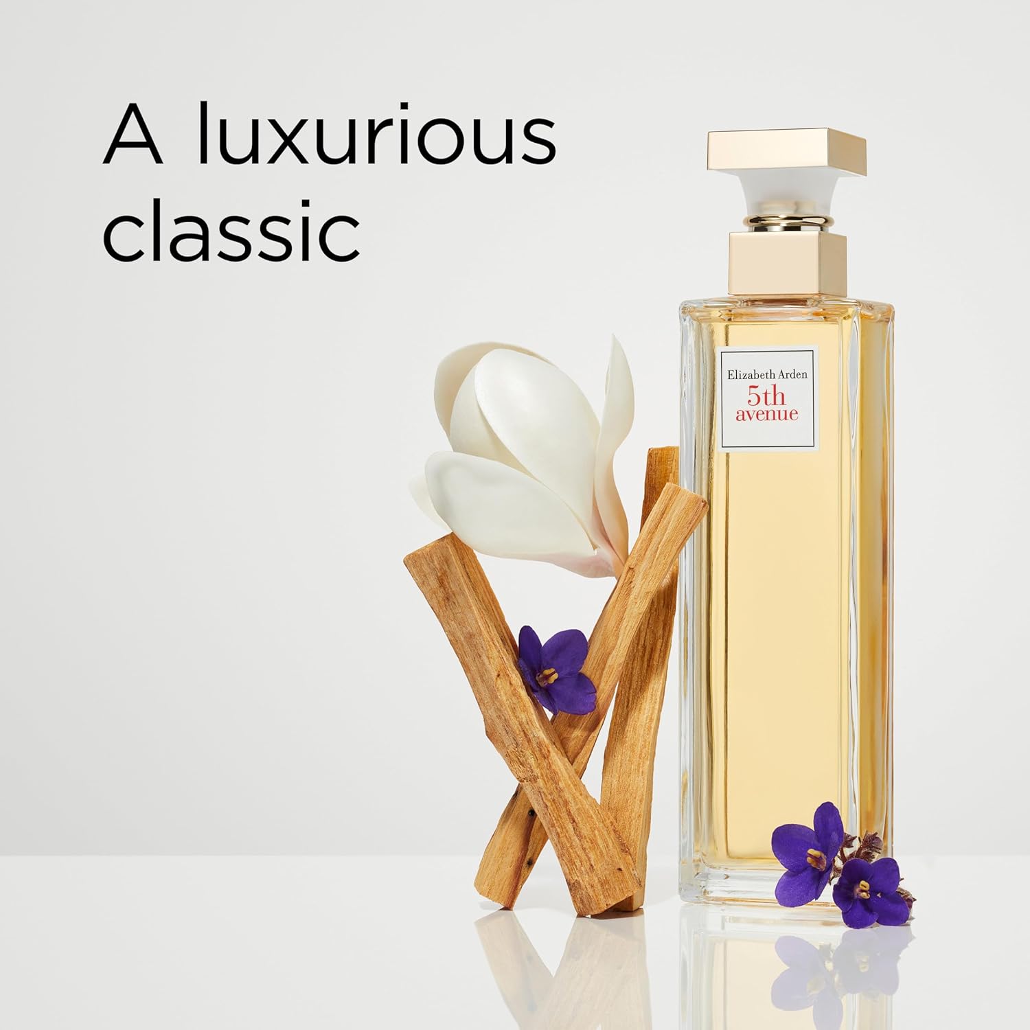 Elizabeth Arden 5th Avenue perfume for women, floral Eau de Parfum bottle with elegant design and golden accents.
