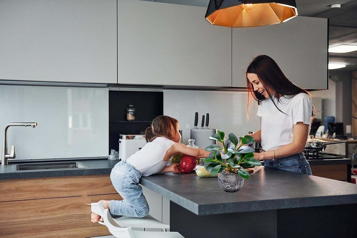 Small potted faux plant with rustic black planter from AlphaAcc, realistic artificial greenery for home decor.