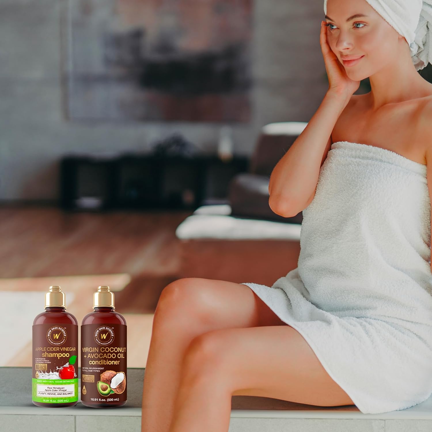 WOW Skin Science Apple Cider Vinegar Shampoo and Coconut Avocado Oil Conditioner duo in 16.9 oz bottles on display.