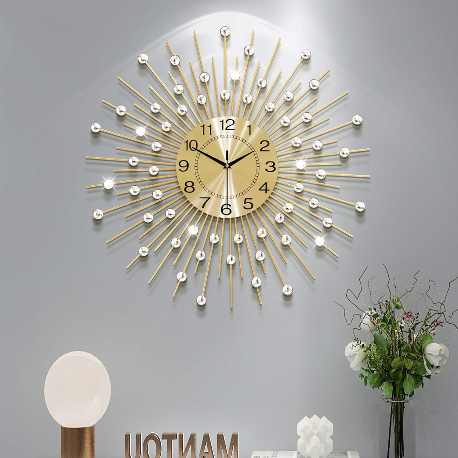Large silent wall clock by YIJIDECOR with a modern design, battery-operated, ideal for living room decor, featuring a clear round face.