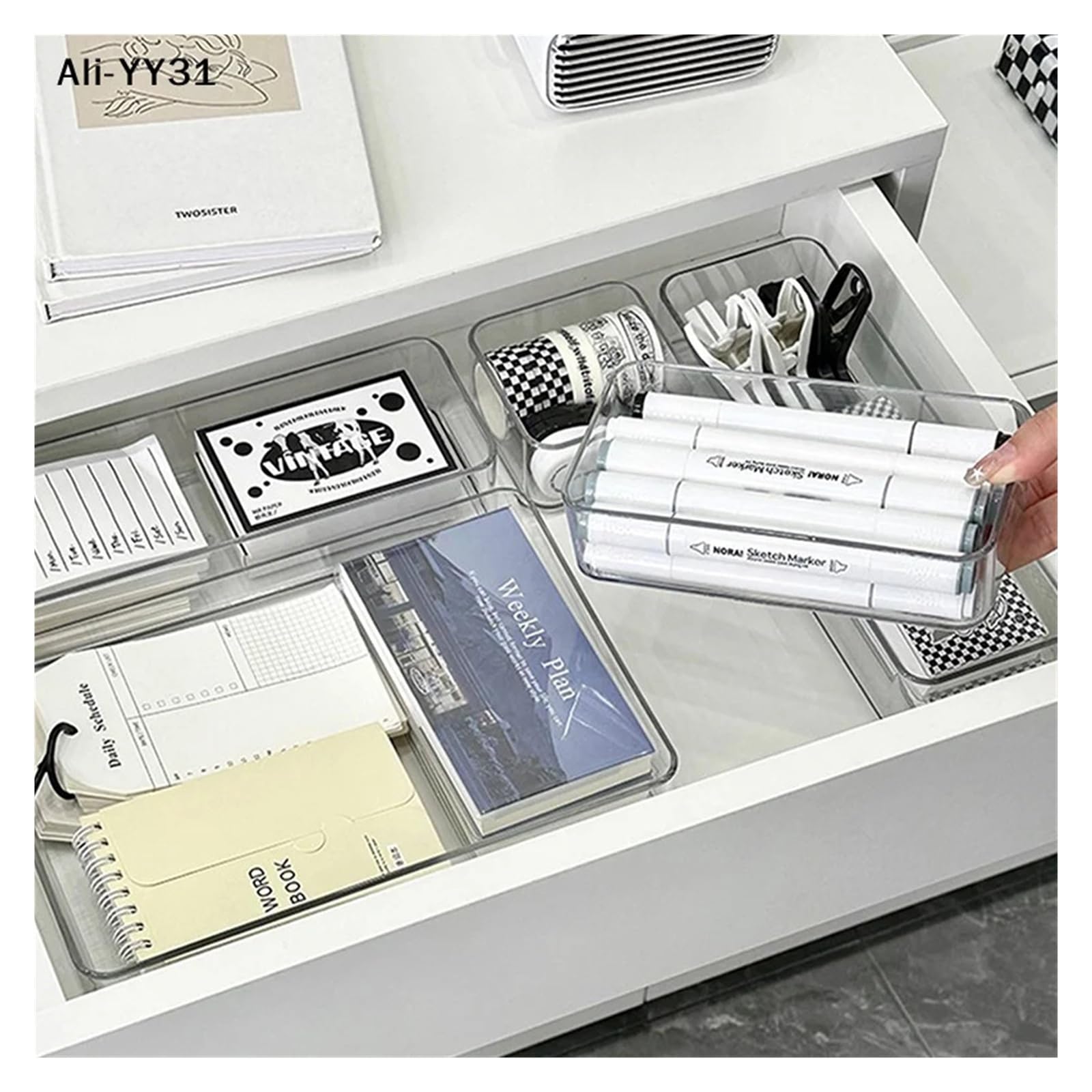 Stackable acrylic caddy with adjustable dividers for cosmetics and makeup storage, featuring modular tray design.
