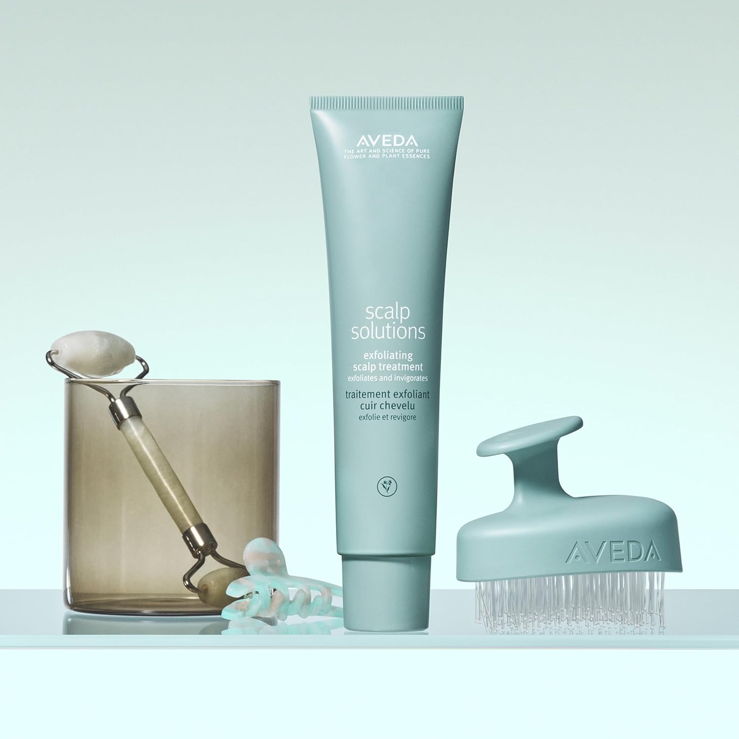 Elefair Aveda Scalp Solutions Stimulating Scalp Massager exfoliates and stimulates the scalp with soft silicone bristles.