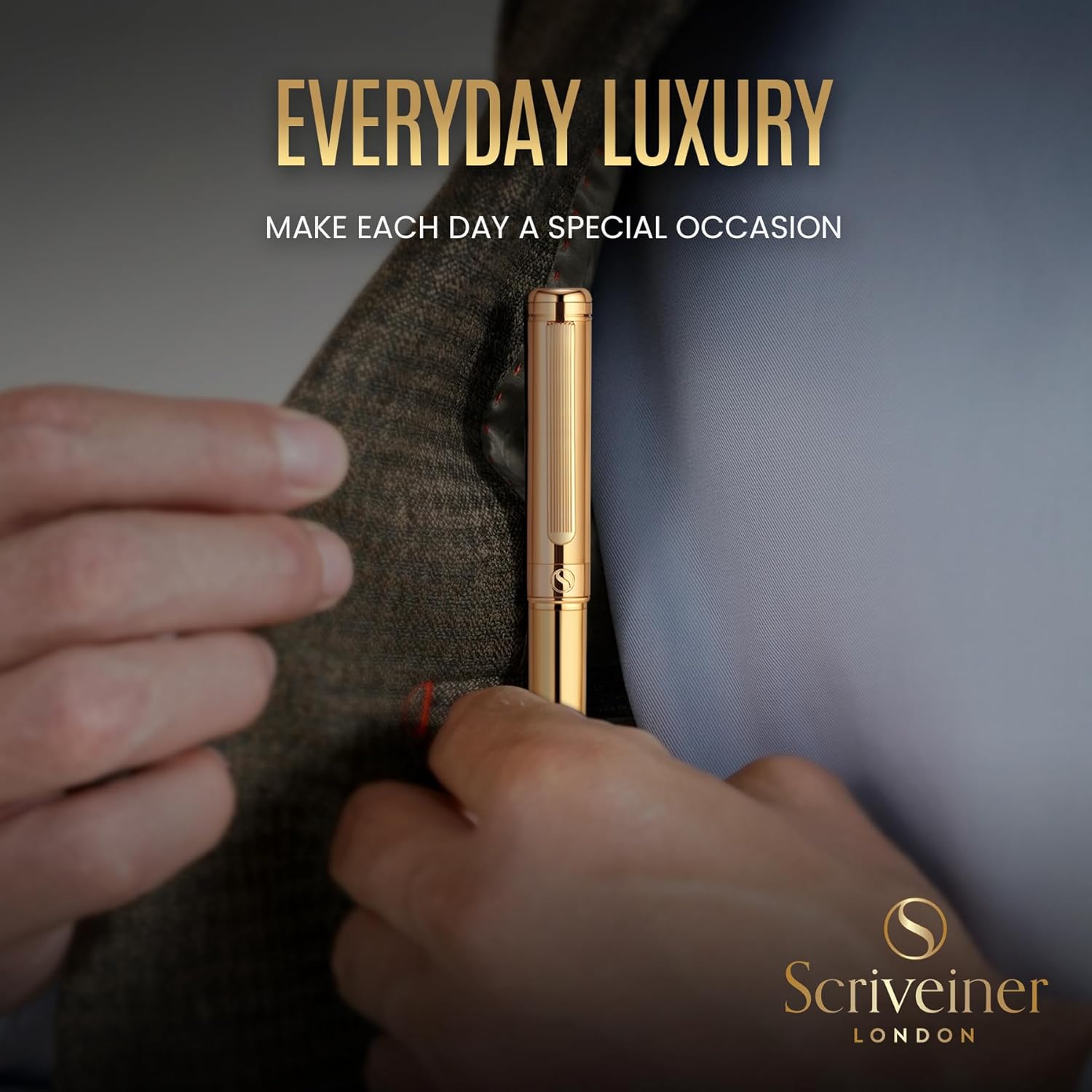 Scriveiner gold ballpoint pen with real gold plating and black Schmidt refill, elegant luxury writing instrument.