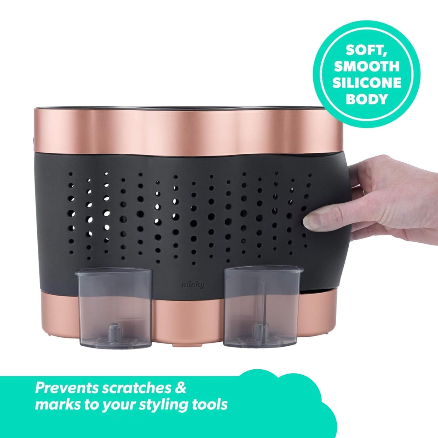 Minky silicone hair tool organizer dock in rose gold and black, holding hair dryer and styling tools on a countertop.