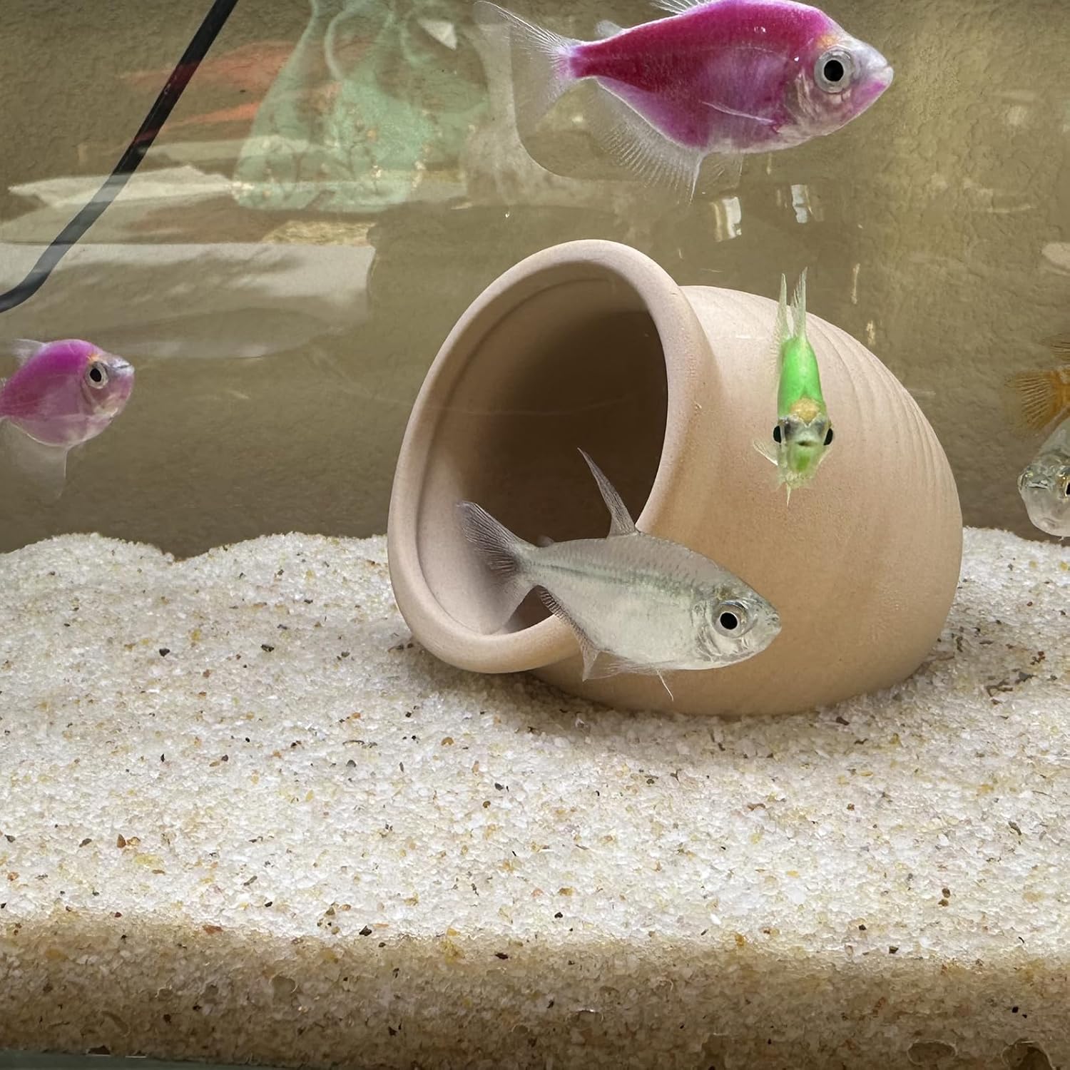 Beige aquarium sand substrate by YISZM, 2-pound bag, showing fine fish tank gravel suitable for freshwater or marine aquariums.