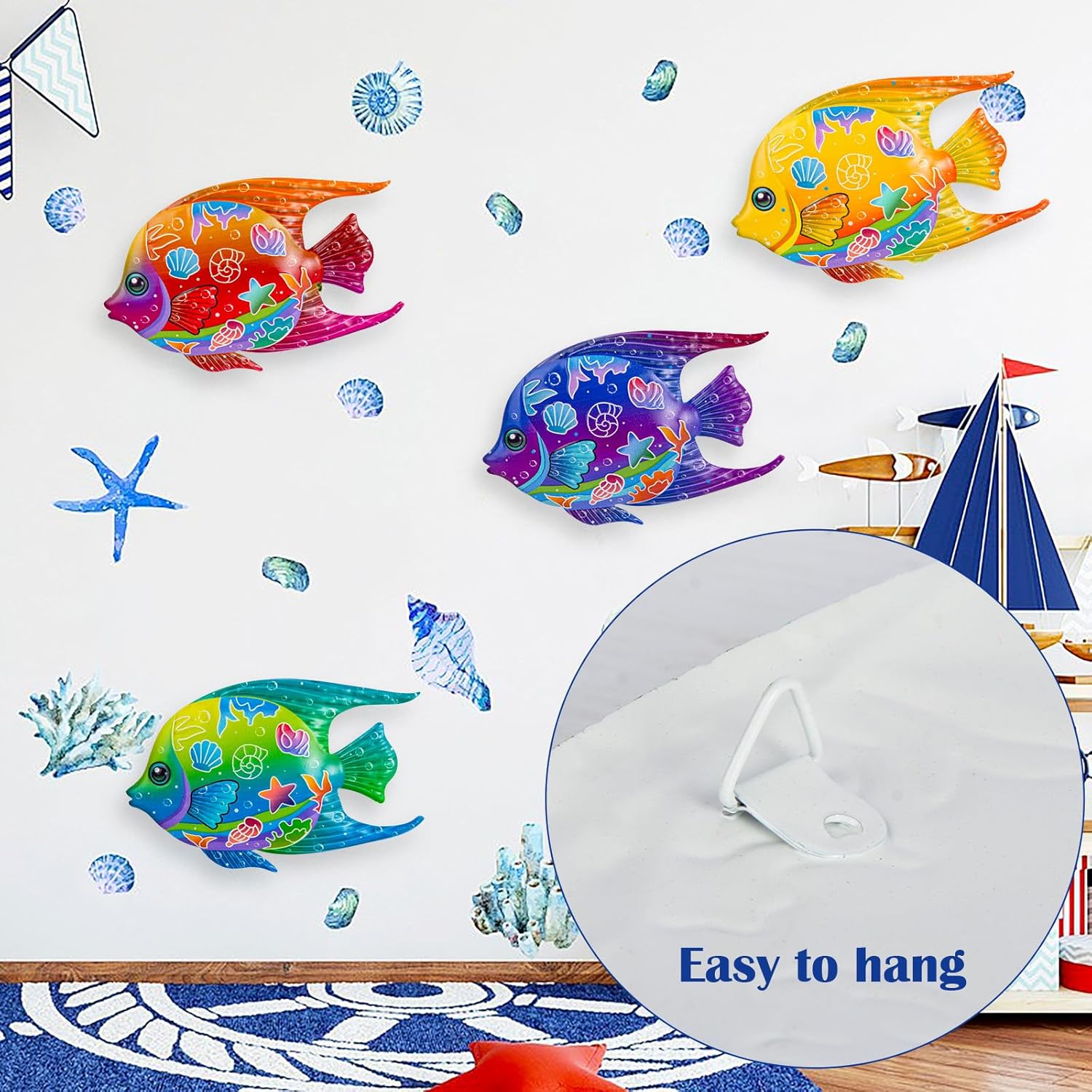 SUNREEK 9-inch metal fish wall art with four nautical fish designs, coastal beach-themed hanging decor for outdoor or pool areas.