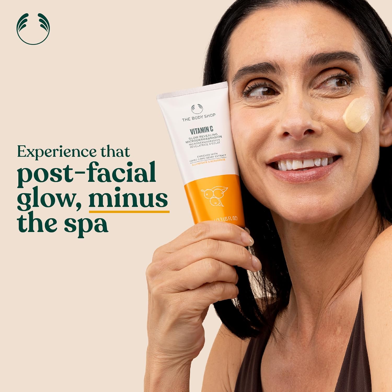 The Body Shop Vitamin C Glow Boosting Microdermabrasion in a 100ml tube, showing the exfoliating cream with vitamin C for dull skin.