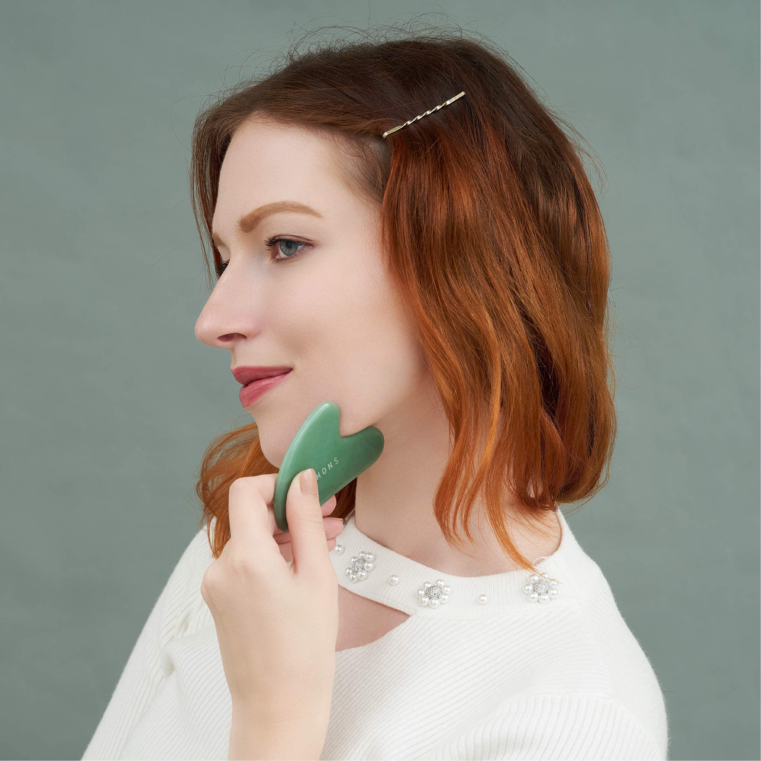 ETHONS Jade Roller and Gua Sha set for facial massage, featuring a microcurrent facial machine for skin rejuvenation.