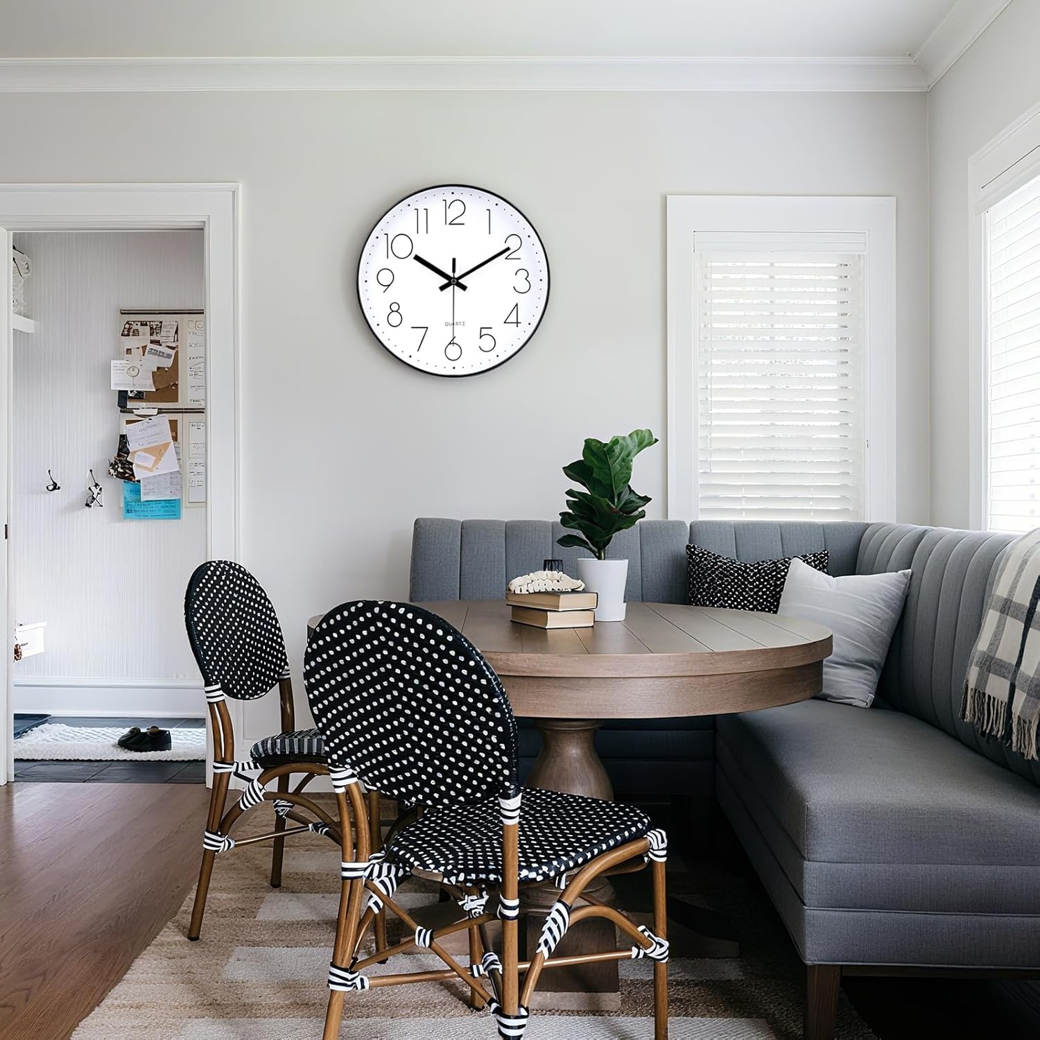 Jomparis 12-inch modern wall clock with silent, non-ticking quartz movement, battery operated, featuring a sleek design.