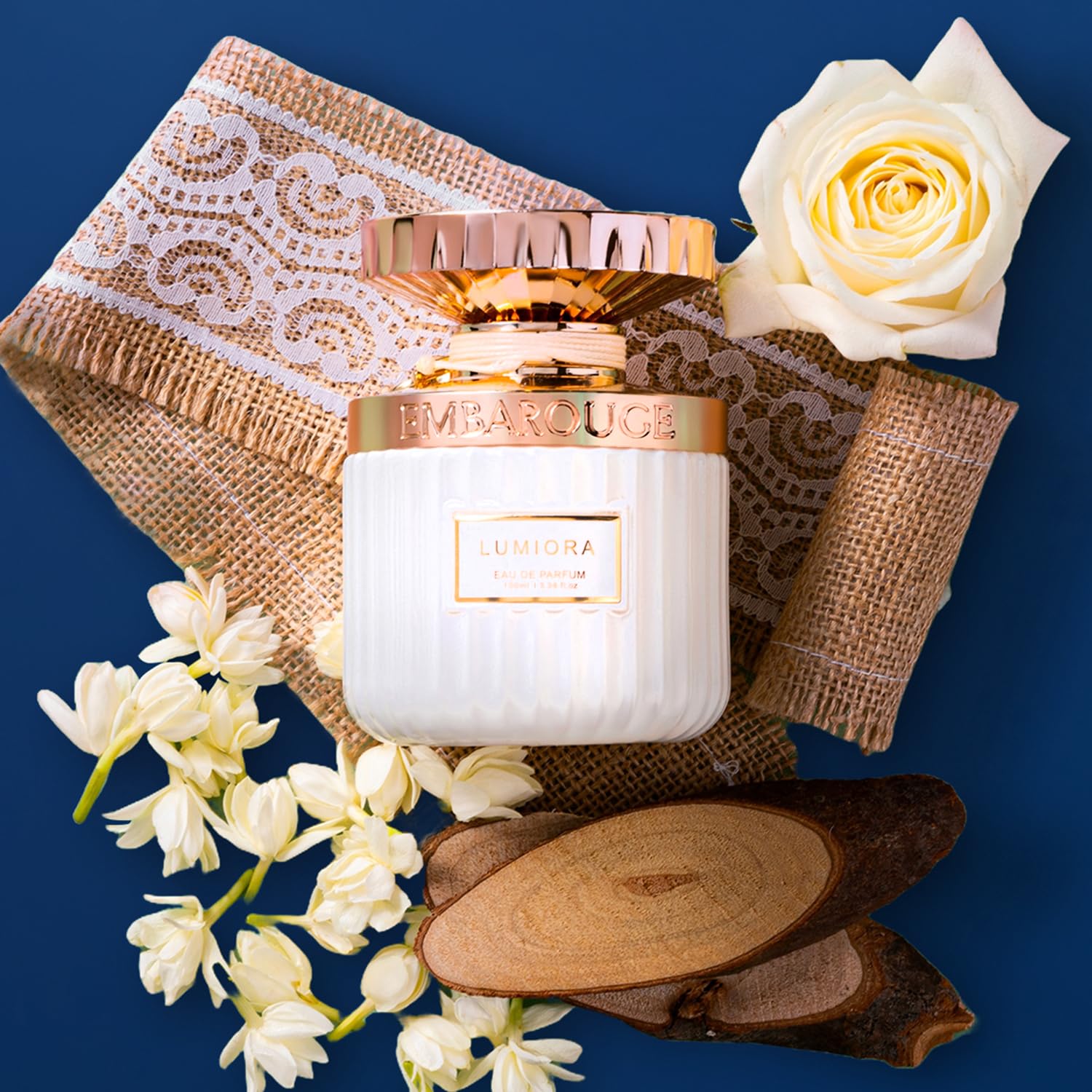 EMBAROUGE Lumiora Eau De Parfum 100ML for women featuring smoky floral scent with black currant and aquatic notes.