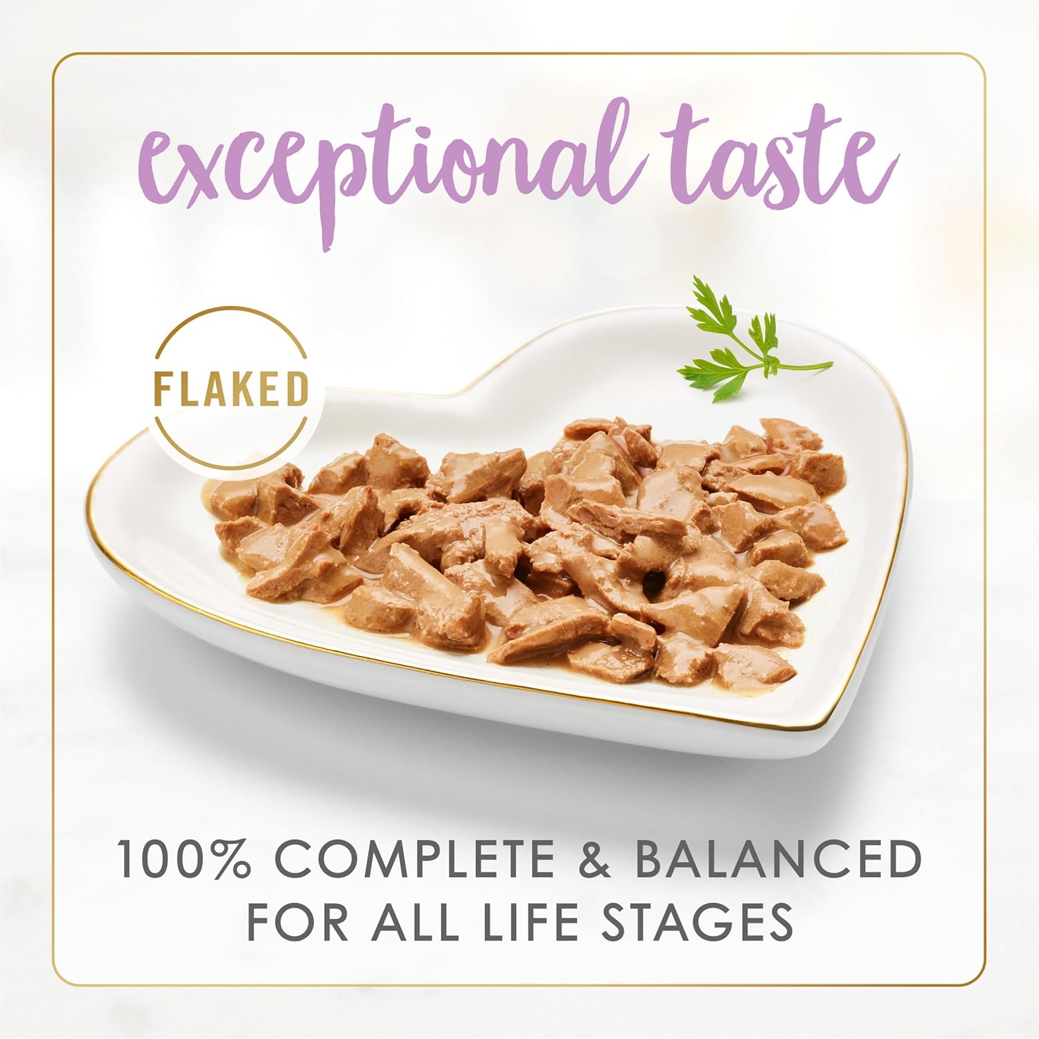 Cans of Purina Fancy Feast wet cat food with flaked tuna and mackerel in 3 oz. cans, displayed in a pack of 24.