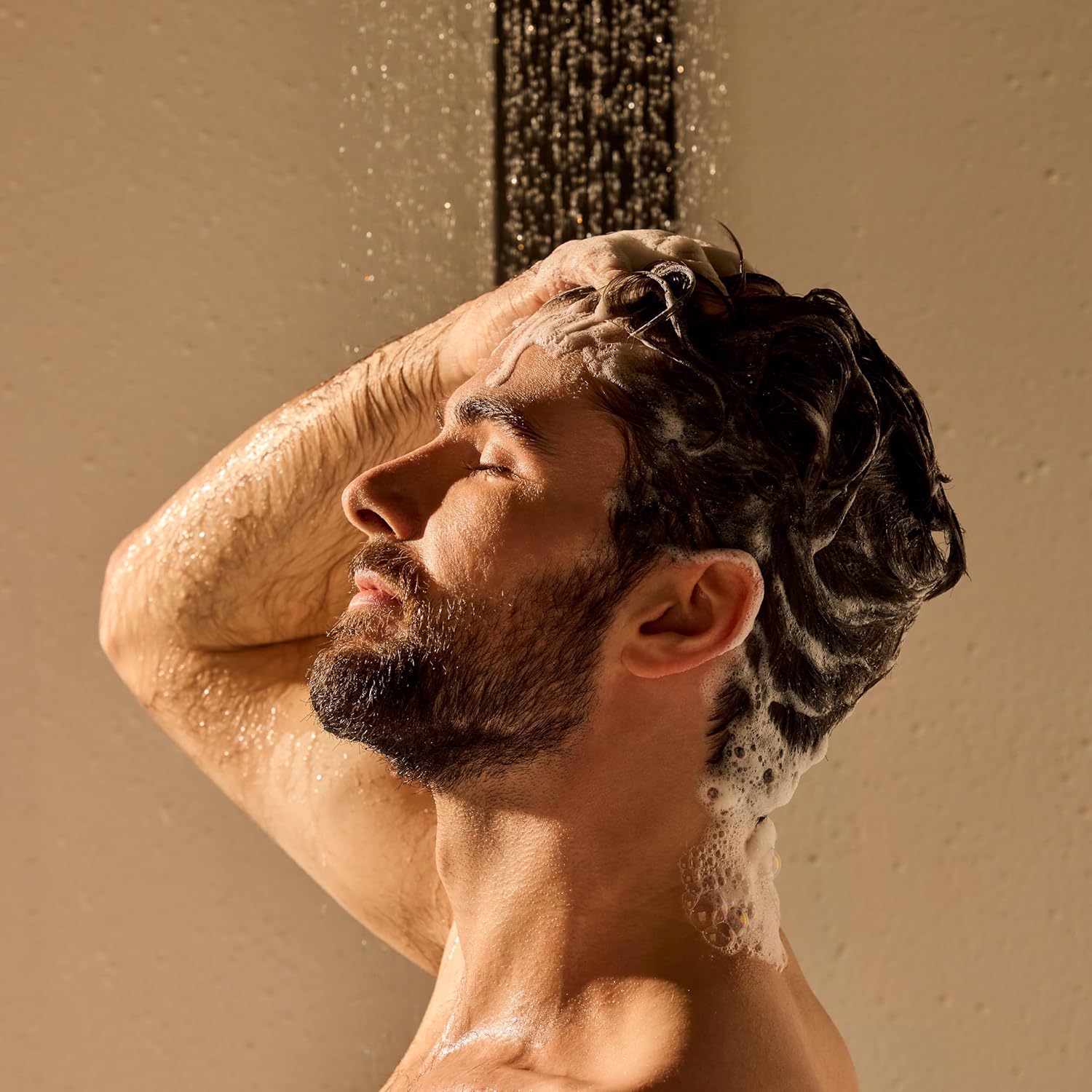 Jack Black Double-Header Shampoo and Conditioner with PureScience Formula in a sleek bottle, suitable for healthy hair care.