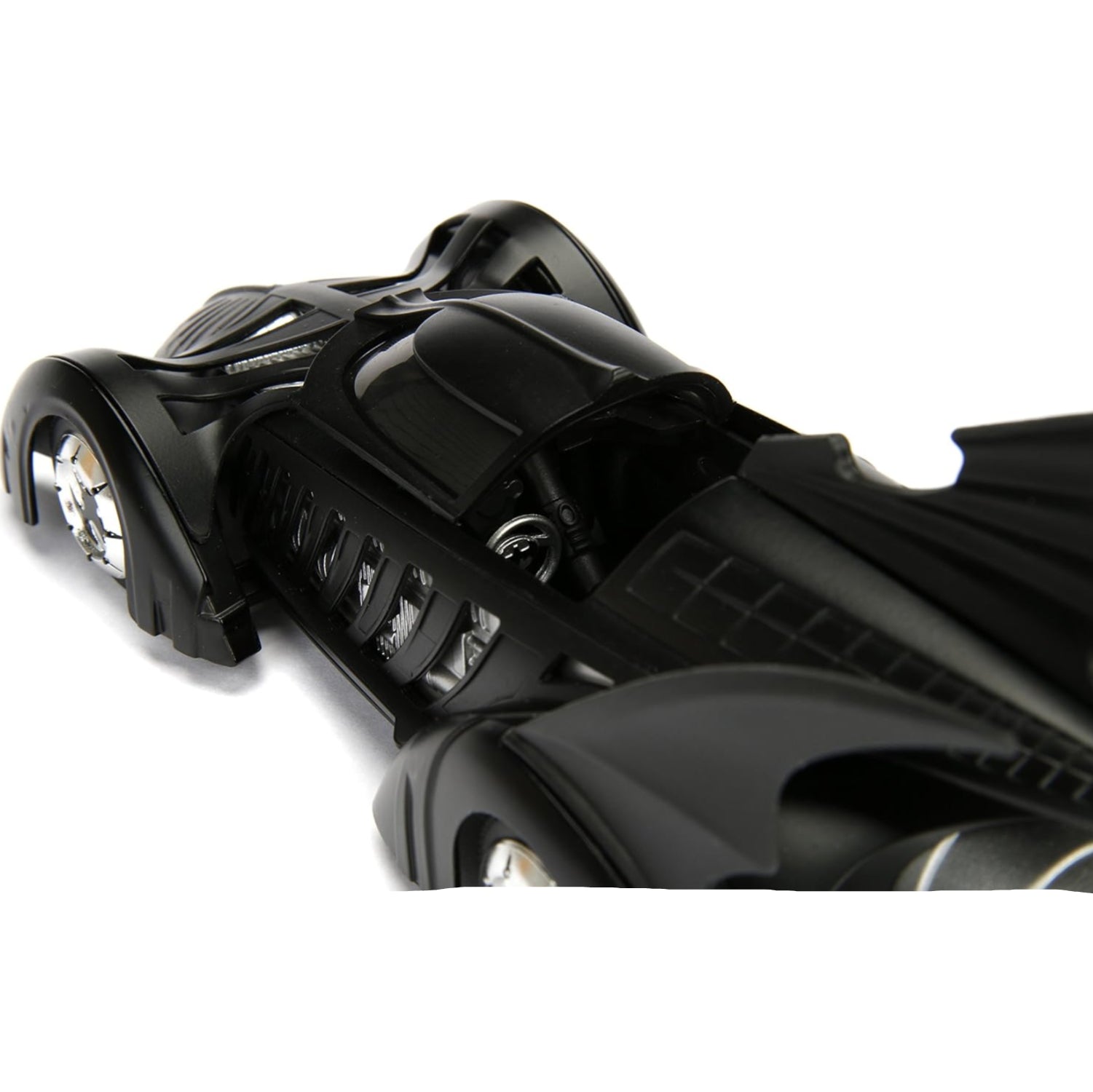 Jada DC Comics Batman Forever Batmobile die-cast vehicle with Batman figure in 1:24 scale, detailed collectible toy.