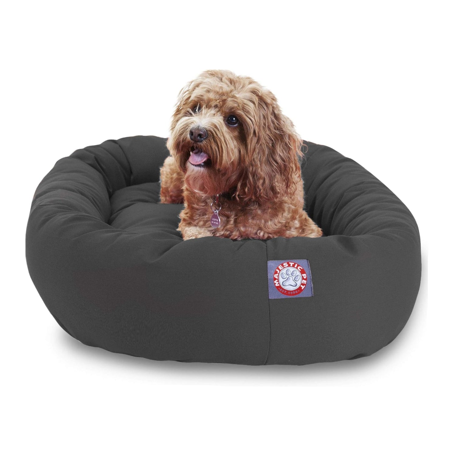 Majestic Pet 32-inch Bagel calming dog bed with soft, washable round design, cozy and comfortable for small to medium dogs.