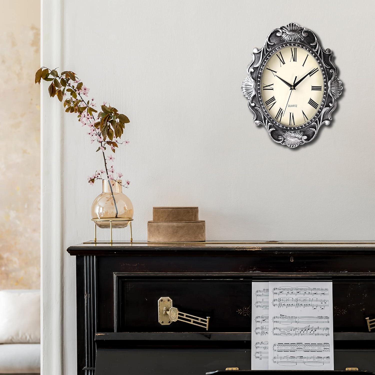 AYRELY® 14-inch oval rustic wall clock with battery-operated mechanism, country-style design, wood finish, and black numerals.