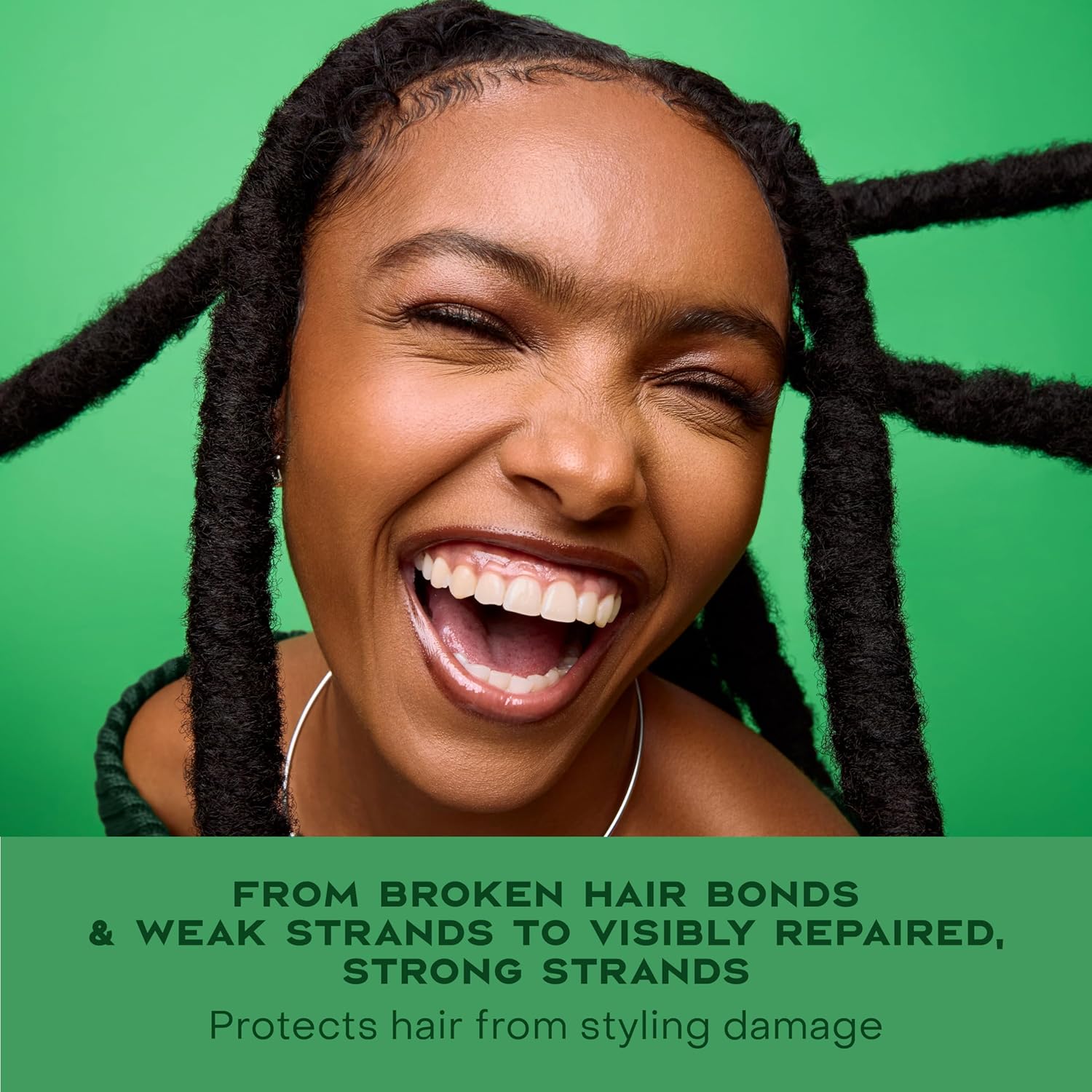 Shea Moisture Amla Oil Bond Repair System bottle with label, showcasing the complete strengthening hair treatment.