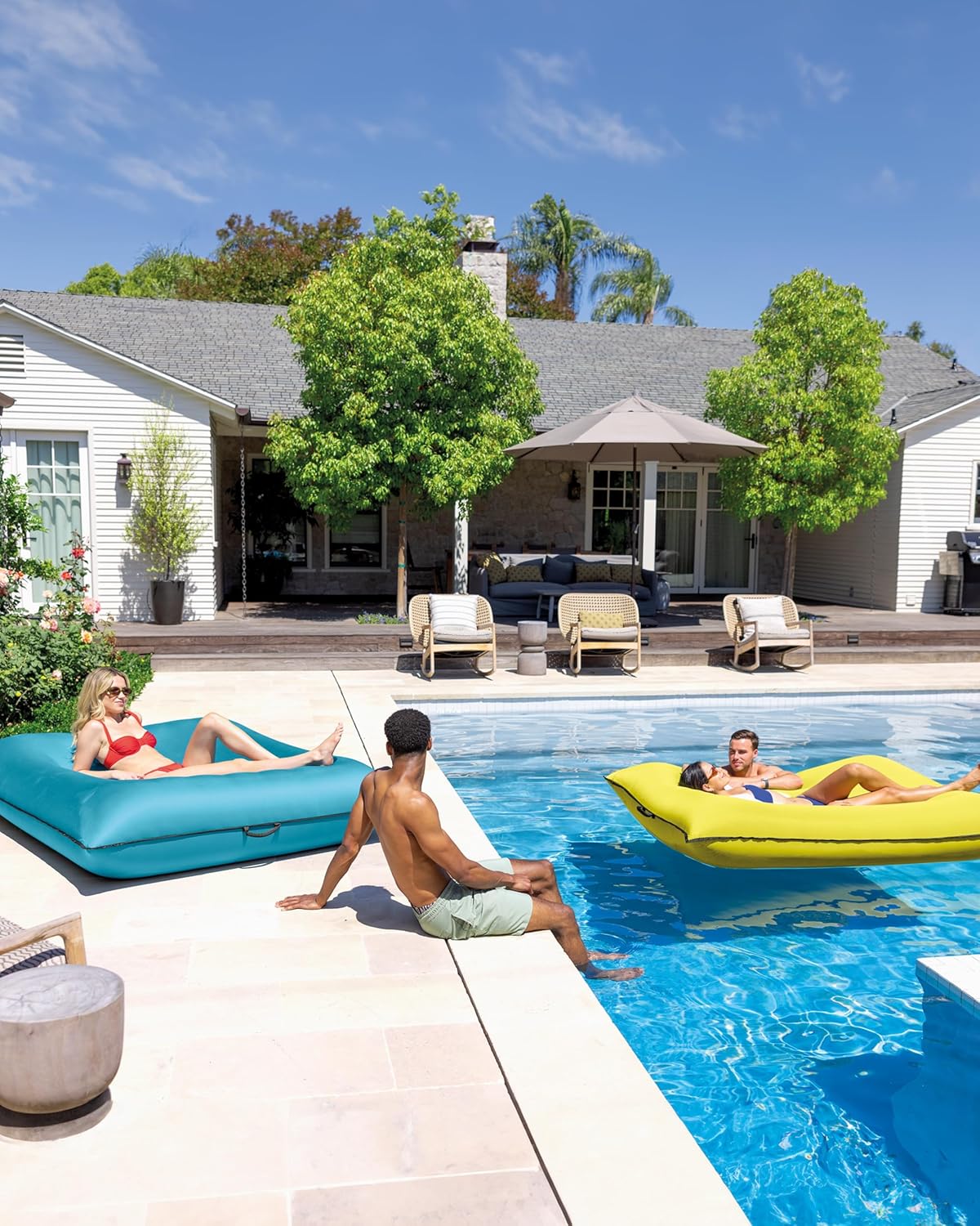 Elefair INTEX Luxe Lounge inflatable pool mat with removable fabric cover and two soft handles, perfect for relaxing in the pool.