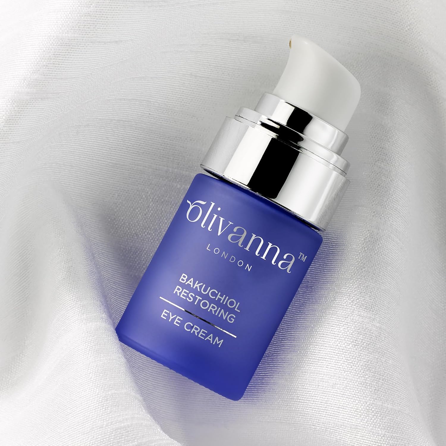 Olivanna Bakuchiol Restoring Eye Cream with elderflower extract, showing the cream jar and natural ingredients.
