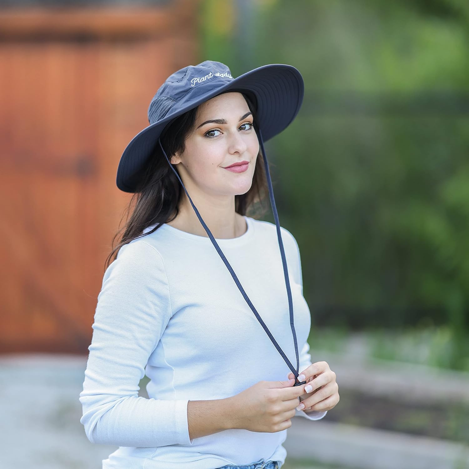 Laila and Lainey Plant Lady wide brim waterproof gardening hat in green, designed for women, with a broad brim for sun protection.