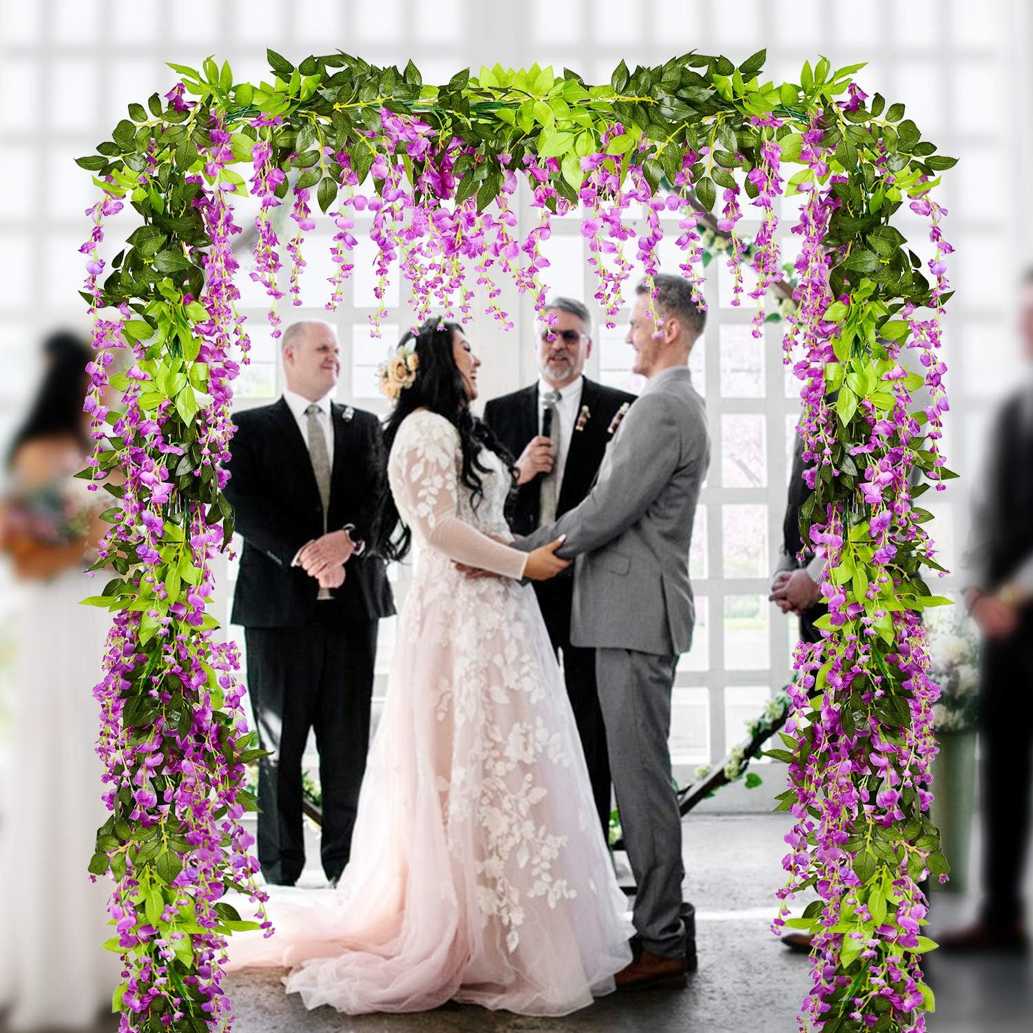 DearHouse 4-piece silk wisteria garland, 6.6 feet long, showing realistic purple and green artificial flower clusters.