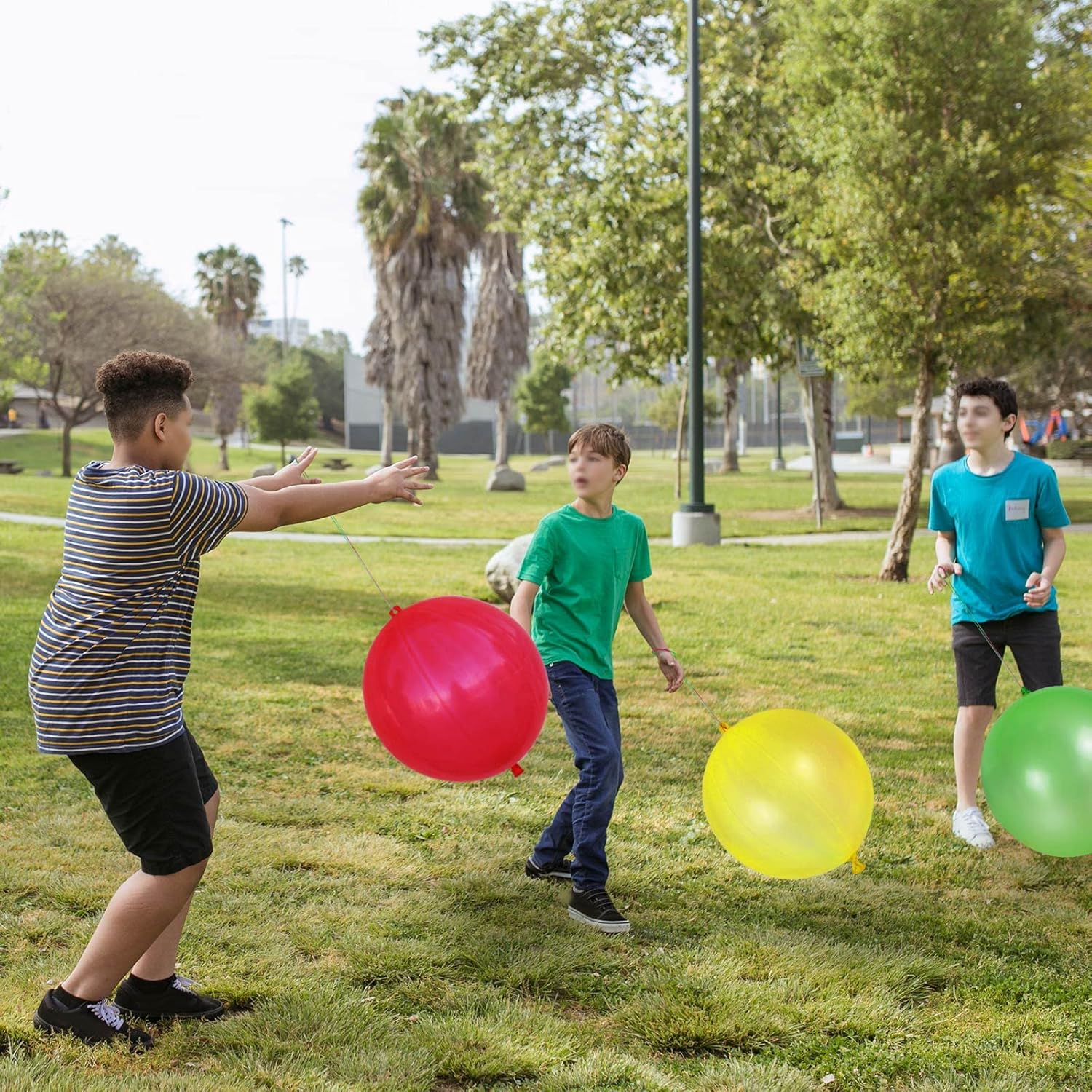 Bright neon punch balloons from LEEZZIZZ, 41-piece set, thickened and heavy-duty for fun outdoor and party activities.