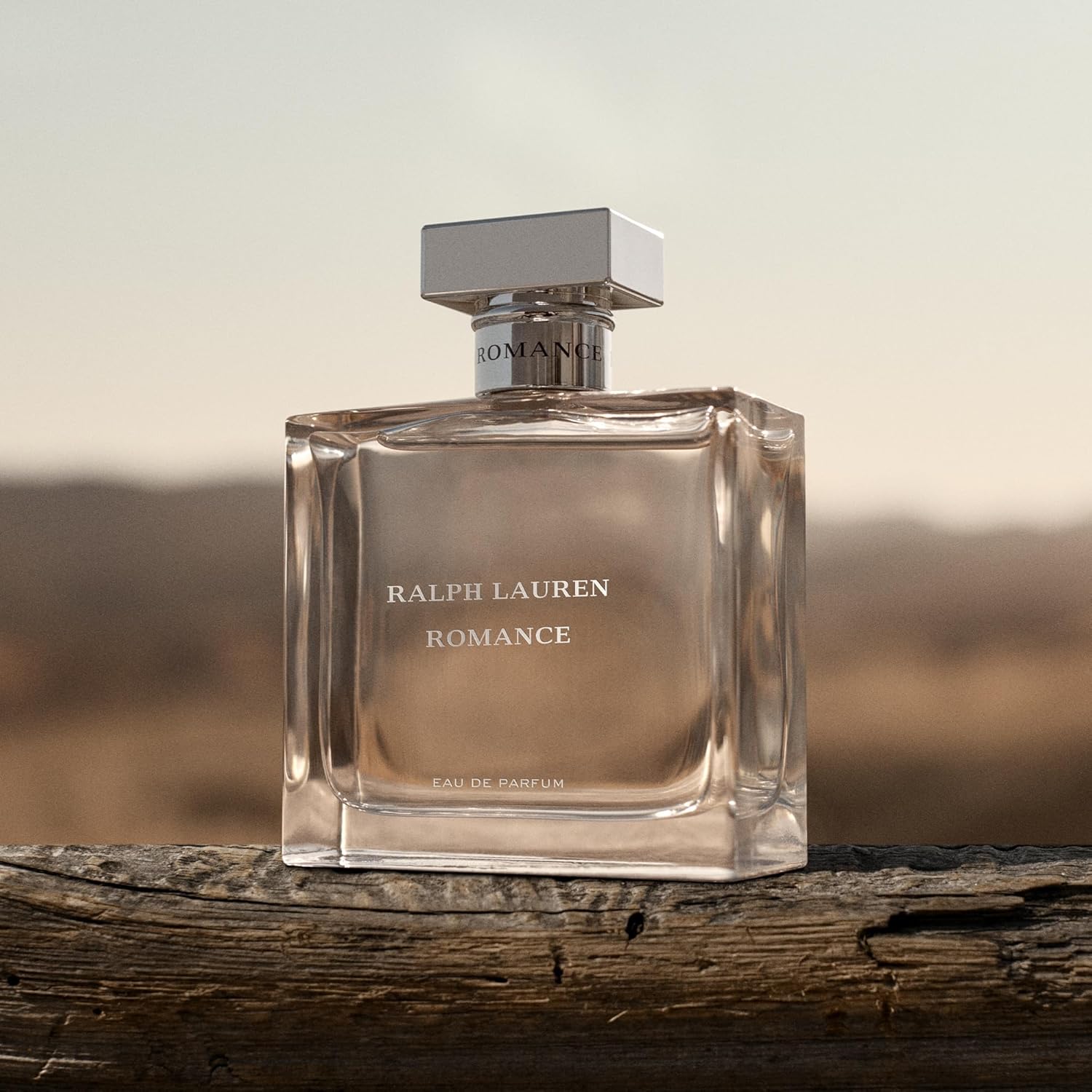 Ralph Lauren Fragrances Romance Eau de Parfum bottle for women, elegant glass perfume bottle with floral design.
