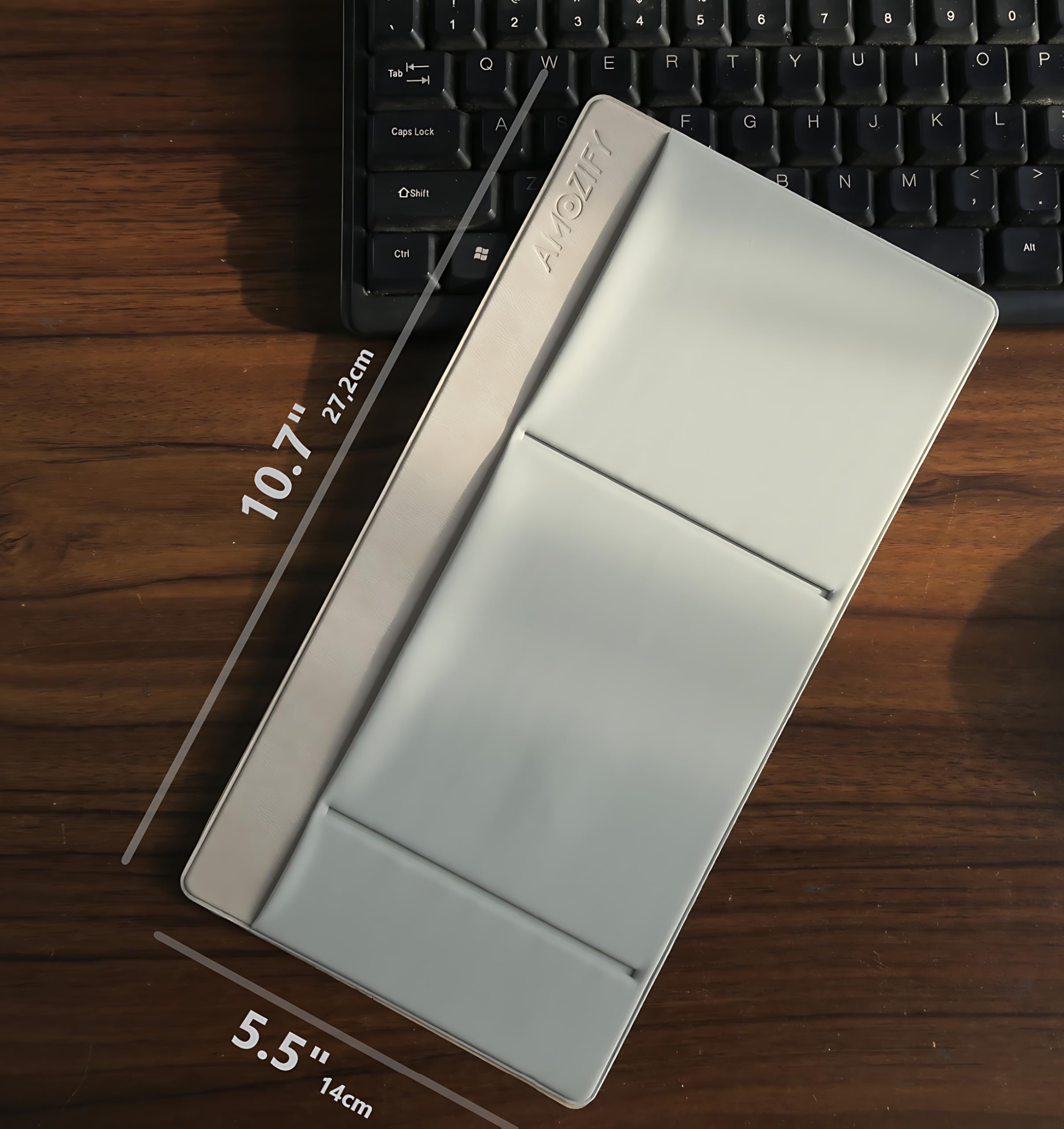 Gray AMOZIFY 3-pocket laptop caddy with mouse holder, adhesive pouch, and SSD storage sleeve for MacBook.