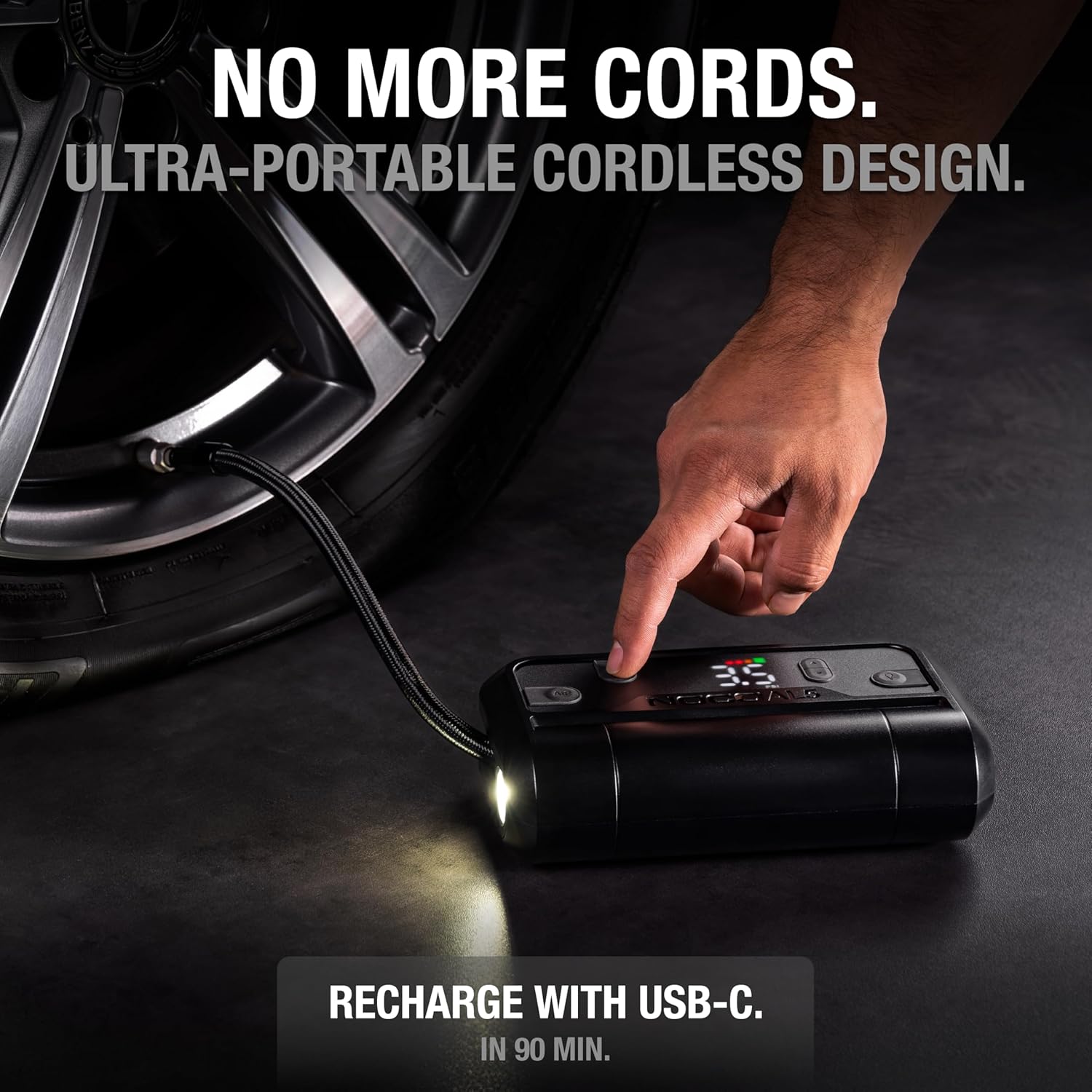 NOCO Air AL5 cordless portable tire inflator with digital display and rechargeable battery, shown in use for inflating car tires.