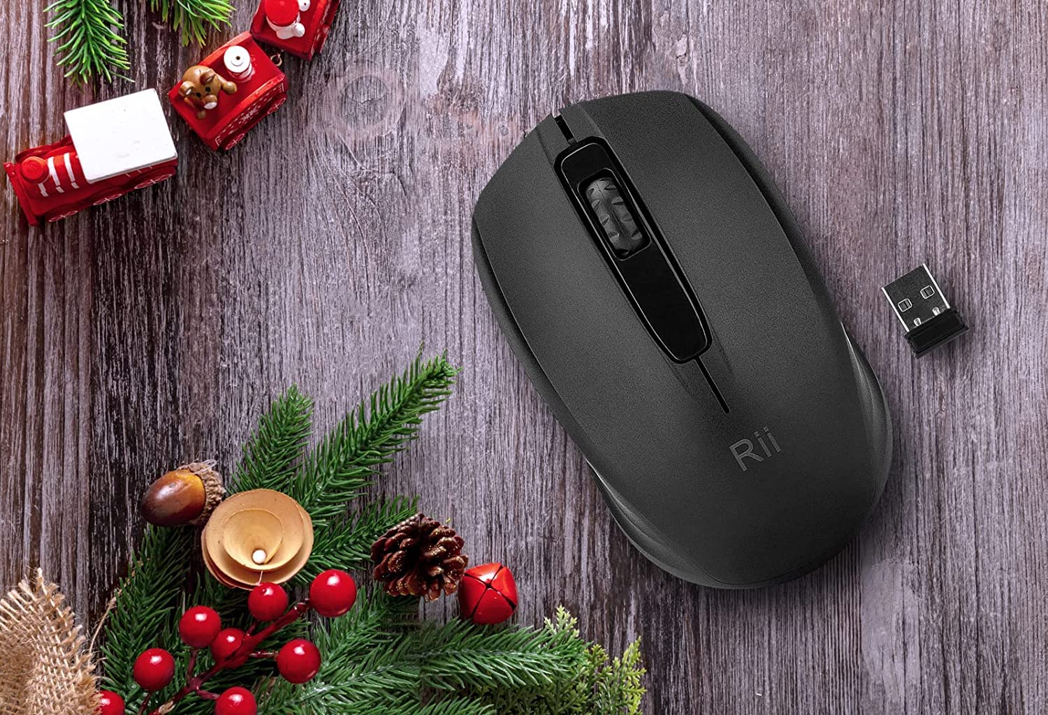 Wireless Rii computer mouse with ergonomic design and 2.4G connectivity, portable input device for laptops and desktops.