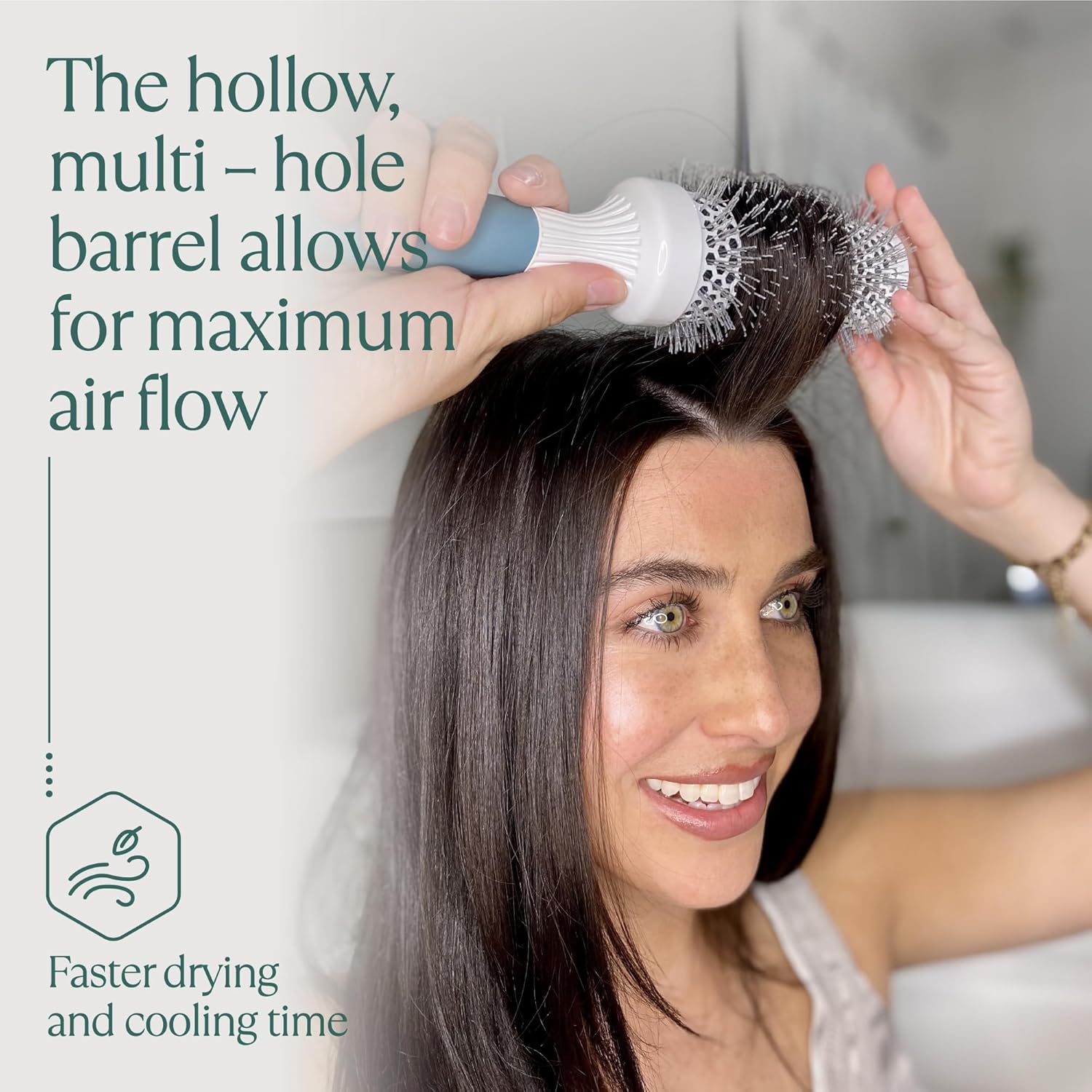 Osensia medium round ceramic hair brush with 43mm barrel for smooth, salon-style styling, suitable for all hair types.