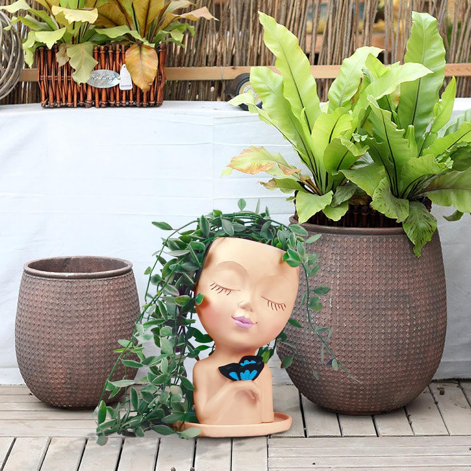 Cute resin face planters for outdoor succulents by WEWEOW, featuring drainage holes and whimsical lady face design.