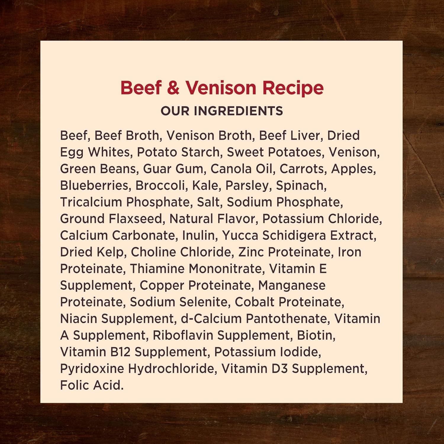 Cans of Wellness CORE Hearty Cuts natural wet grain-free dog food with chunks of meat and vegetables in savory gravy.