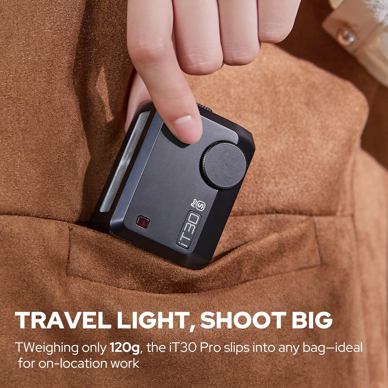 GODOX iT30 Pro F TTL wireless camera flash mounted on Fuji camera, showing compact design and control panel for professional photography.